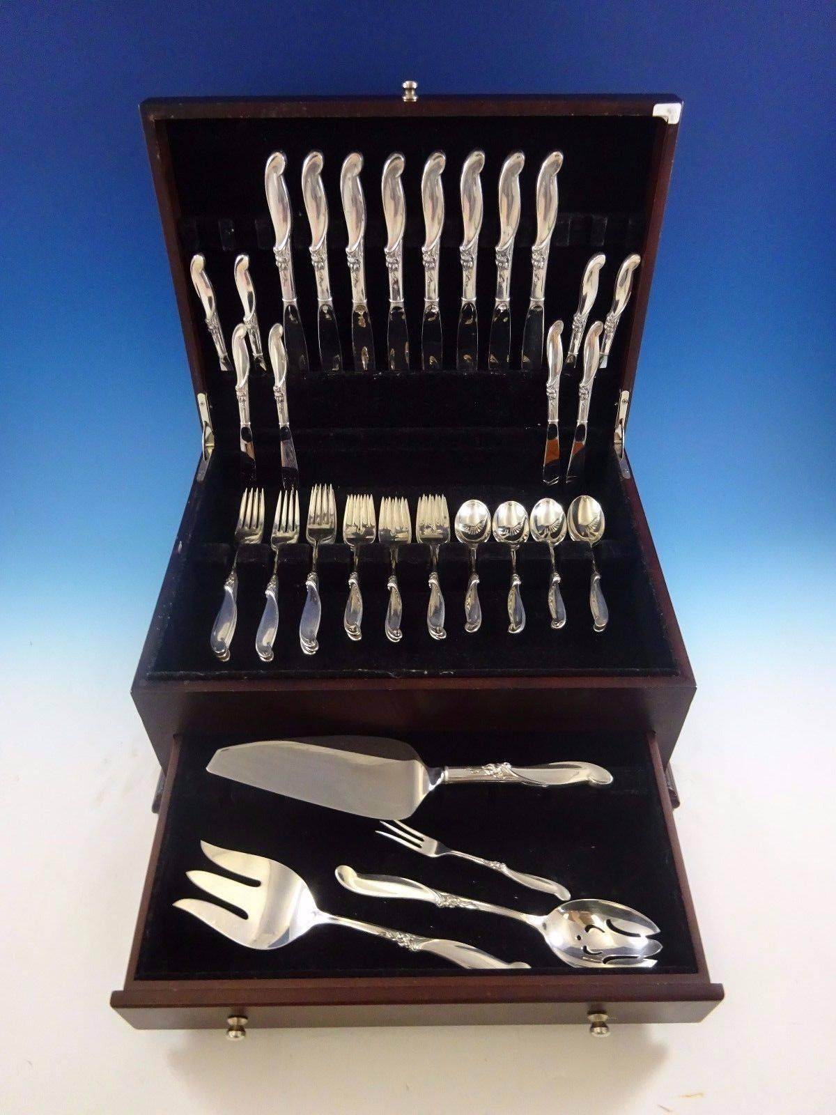 Mid-Century Modern Silver Melody by International sterling silver flatware set of 44 pieces. This set includes:

Eight knives, 9 1/8