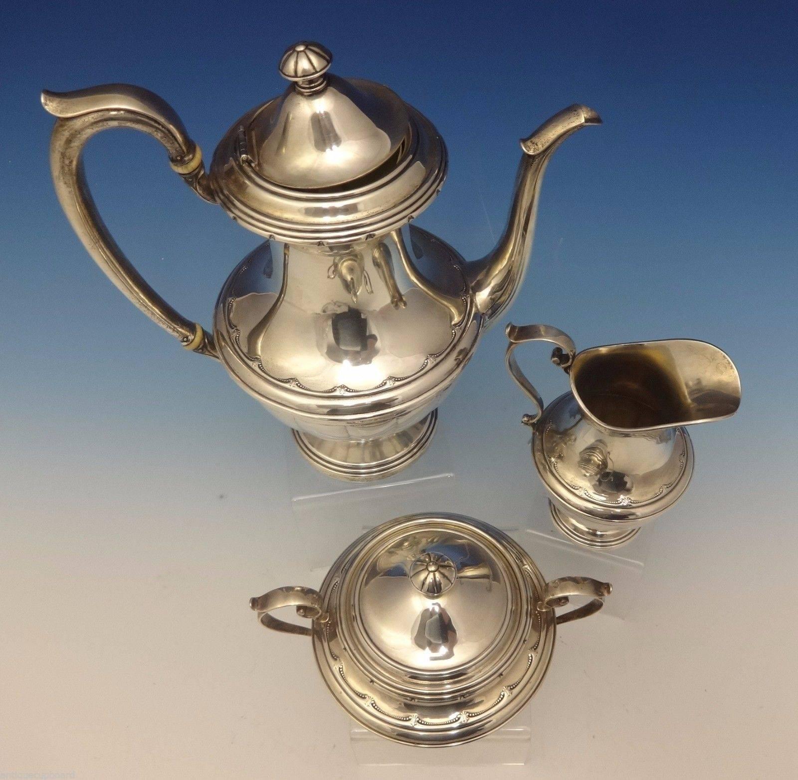 Old Colonial by Towle.

Lavishly decorated and representing the height of the silversmith’s craft, Old Colonial is a peerless expression of sophistication in sterling.
Marvelous Old Colonial by Towle three-piece sterling silver tea set. The set is