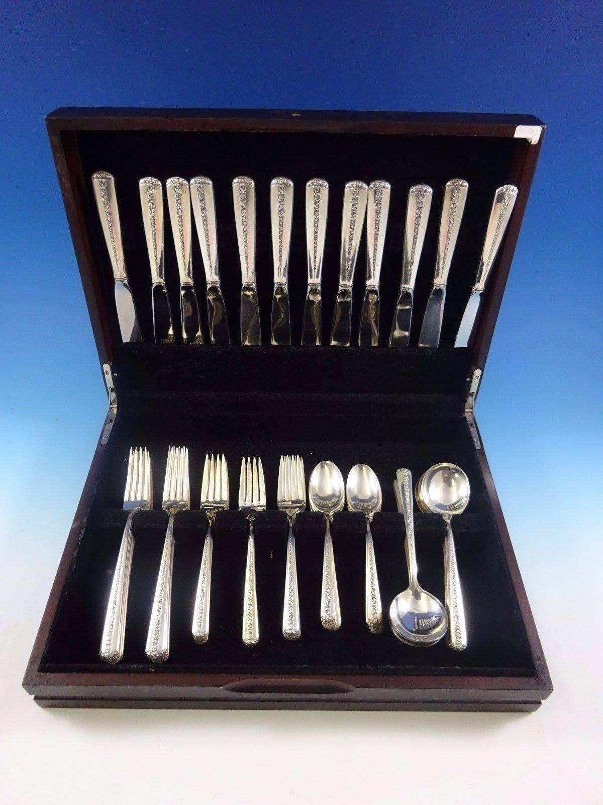 Rambler Rose by Towle Sterling Silver flatware set 60 pieces. This set includes:

12 knives, 8 5/8