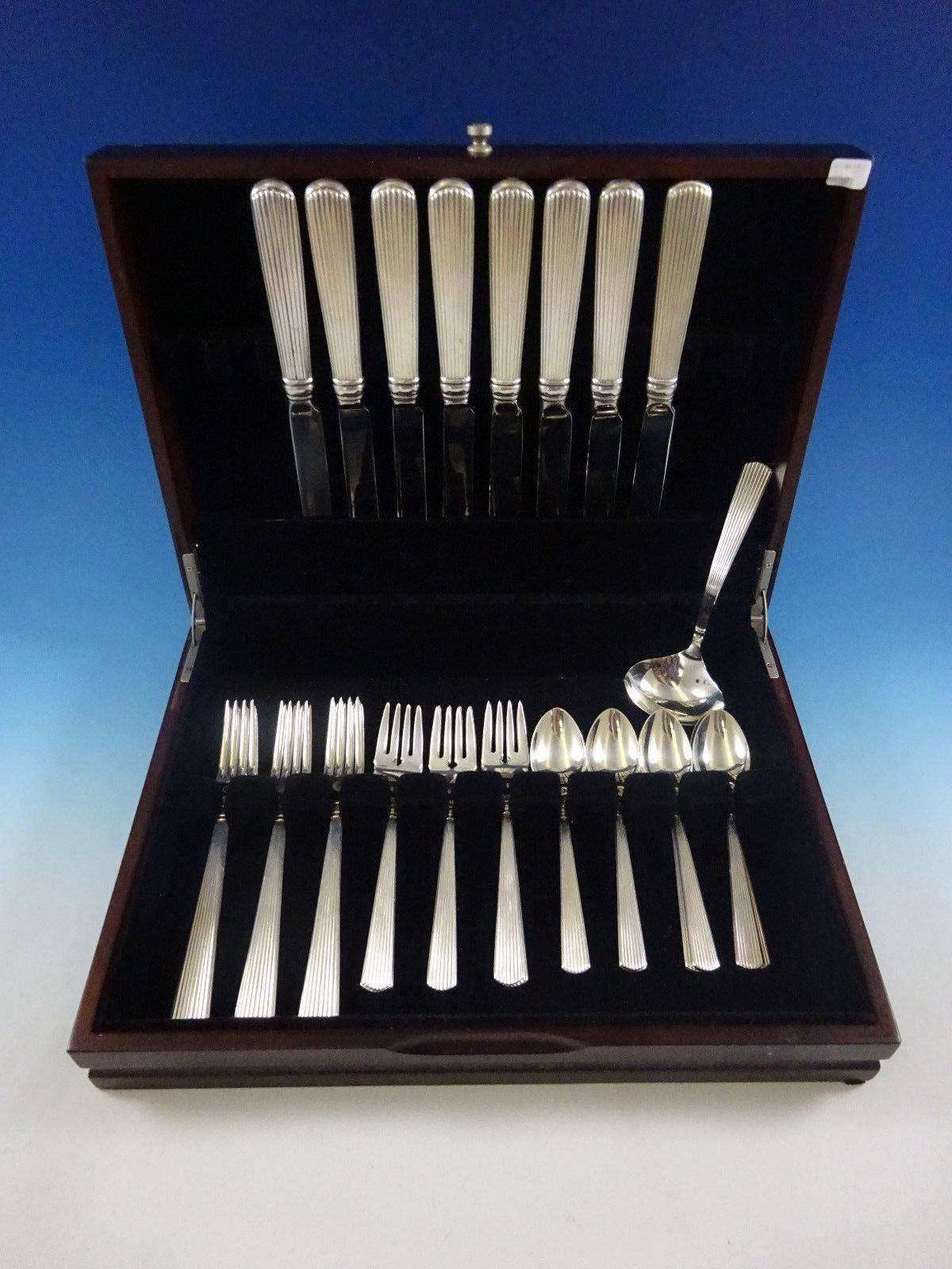 Ashmont by Reed & Barton is a sleek and heavy sterling silver flatware pattern with elegant linear fluting, providing a timeless elegance sure to enhance any tabletop.

Exceptional Ashmont by Reed & Barton sterling silver dinner size flatware set of