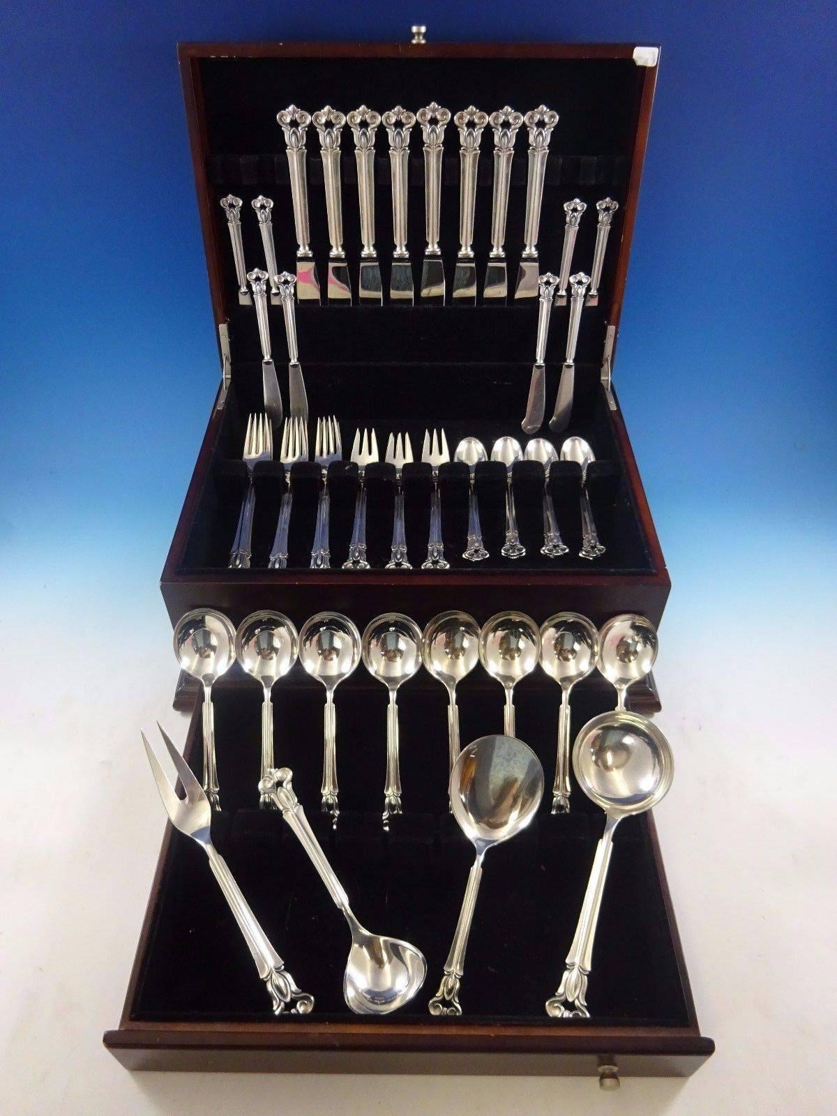Monica by Cohr sterling silver dinner size flatware set of 52 pieces. This set includes:

Measures:
Eight dinner knives, 8 3/4