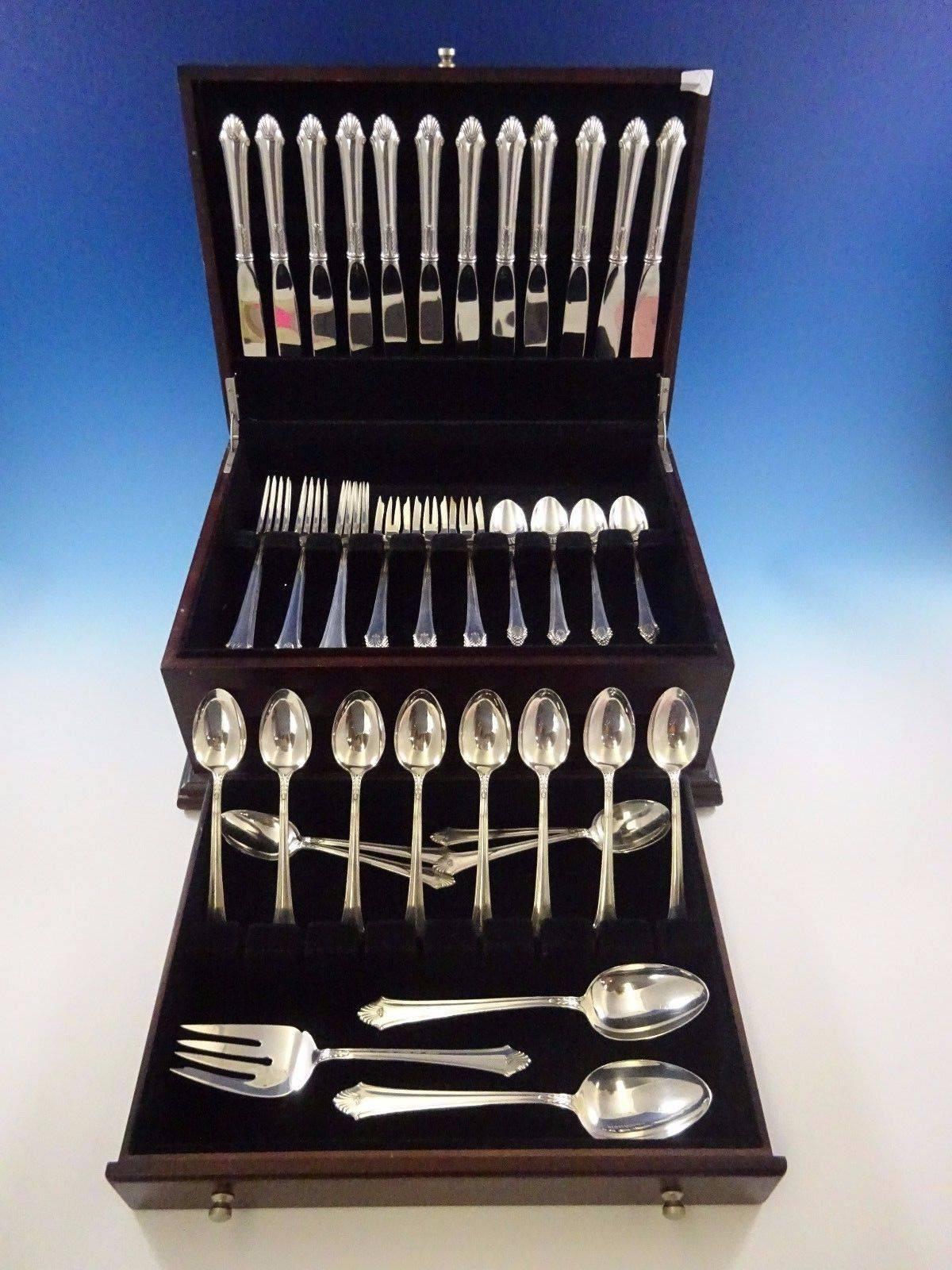 Lovely Edgemont by Gorham sterling silver dinner size flatware set of 63 pieces. This set includes:
 
12 dinner knives, 9 3/8