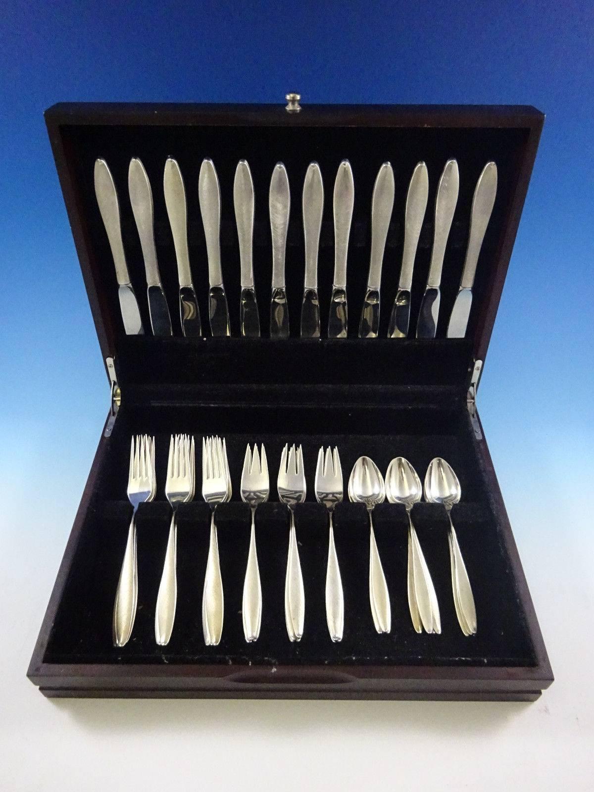 Gorgeous matte/brushed finish Mid-Century Modern RSVP by Towle sterling silver flatware set of 48 pieces. 

This set includes:

12 knives, 9