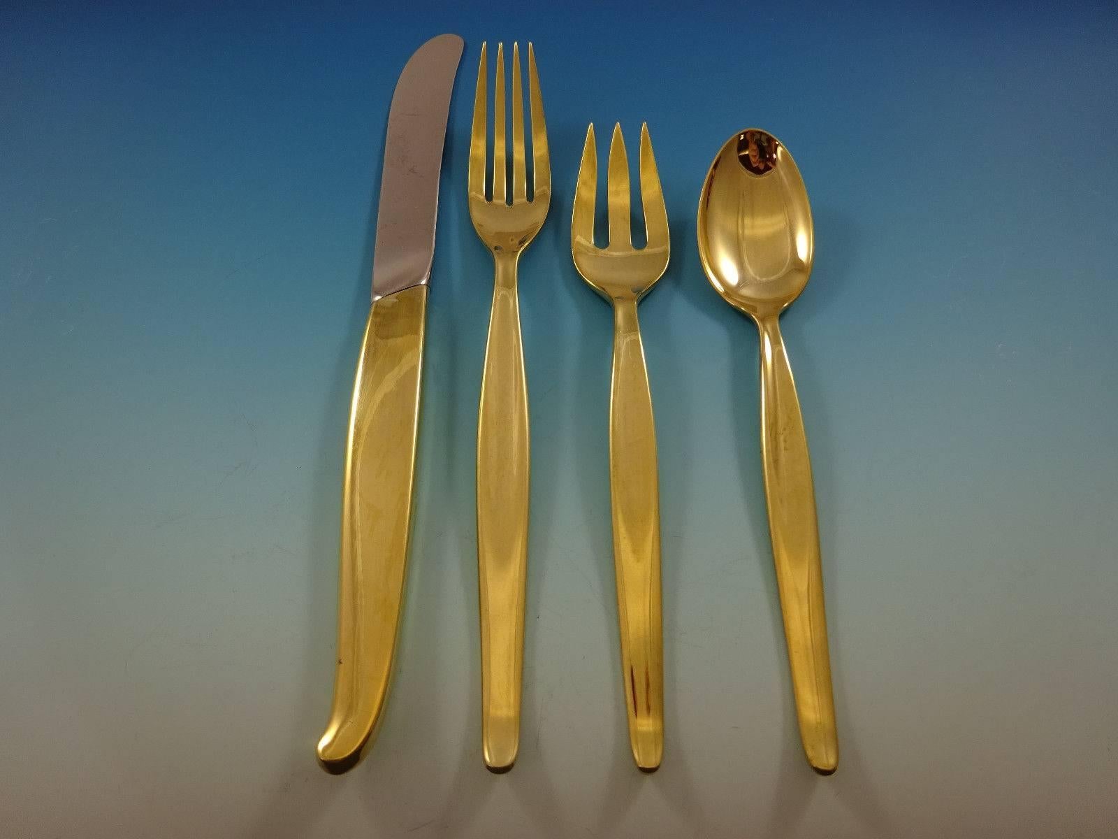 Gorgeous contour gold by Towle sterling silver flatware set - 48 pieces. Gold flatware is on trend and makes a bold statement on your table. This set is vermeil (completely gold-washed over sterling silver) and includes:

12 knives, 8 7/8