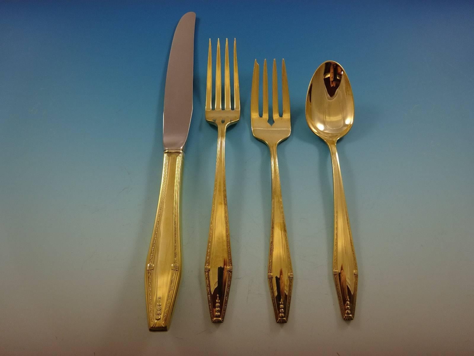 Formality by State House sterling silver flatware set - 48 pieces.  Gold flatware is on trend and makes a bold statement on your table, especially when paired with gold-rimmed China and gold accents. This set is vermeil (completely gold-washed) and