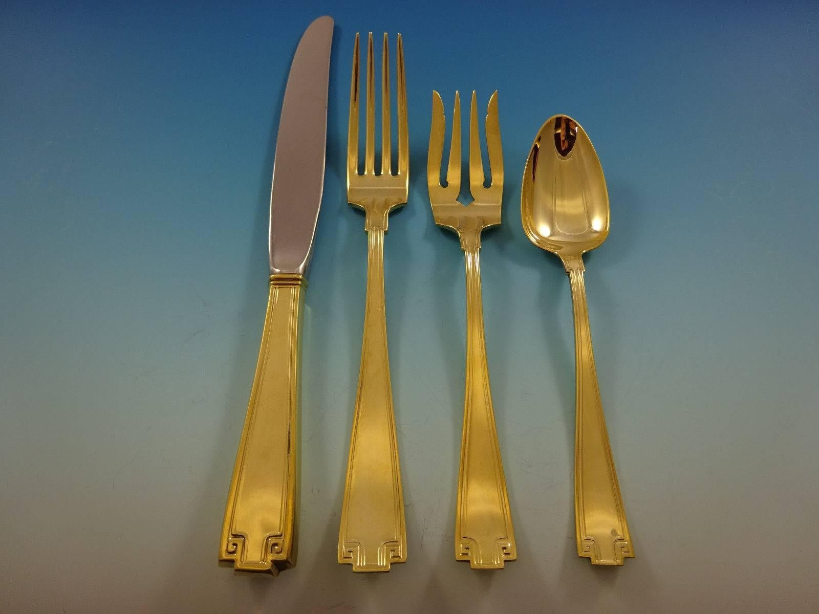 Etruscan by Gorham sterling silver flatware set of 48 pieces. 

Gold flatware is on trend and makes a bold statement on your table, especially when paired with gold rimmed china and gold accents. This set is vermeil (completely gold-washed) and