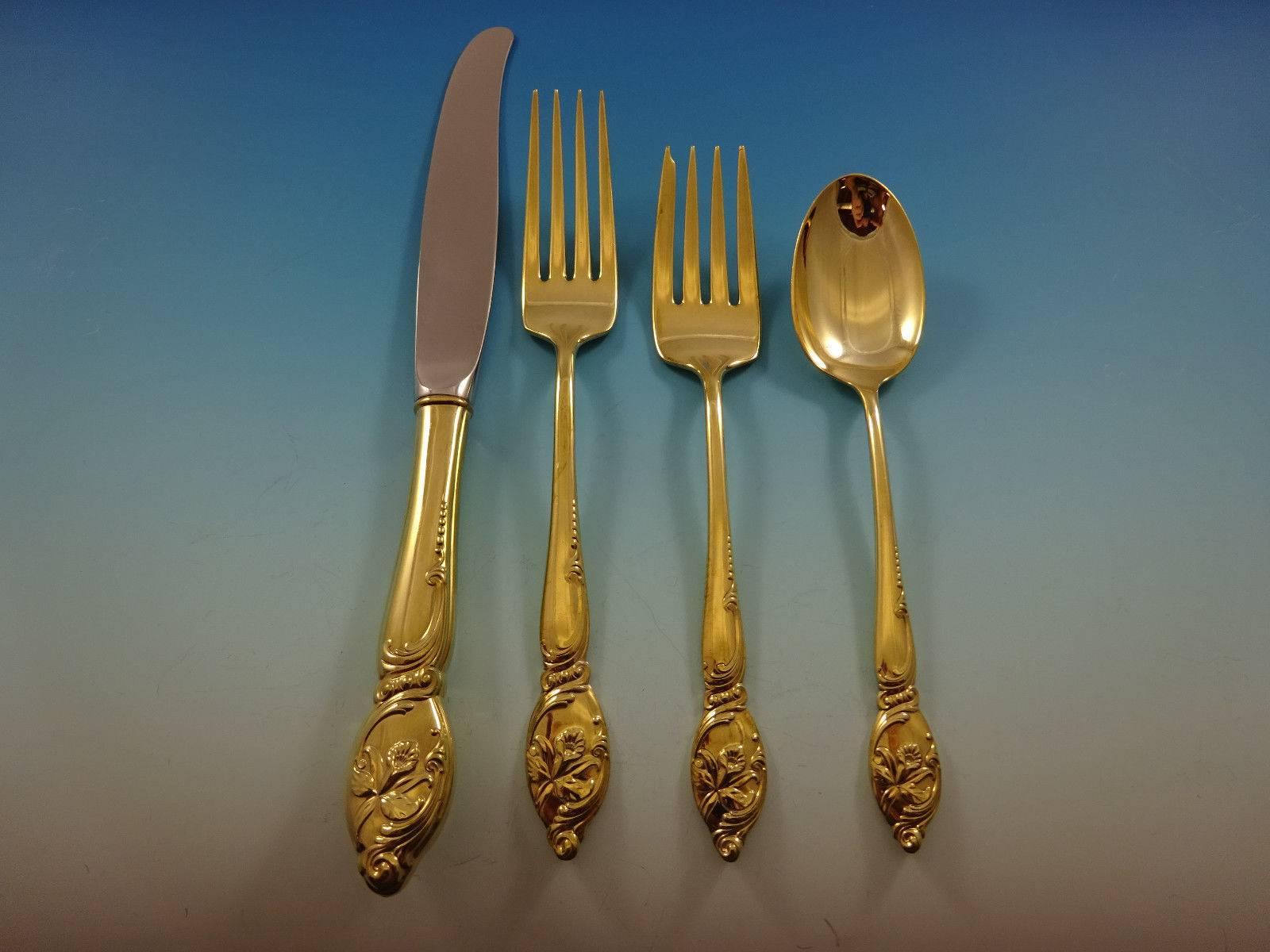 Enchanting orchid gold by Westmorland sterling silver flatware set - 48 pieces. 

Gold flatware is on trend and makes a bold statement on your table, especially when paired with gold rimmed China and gold accents. This set is vermeil (completely