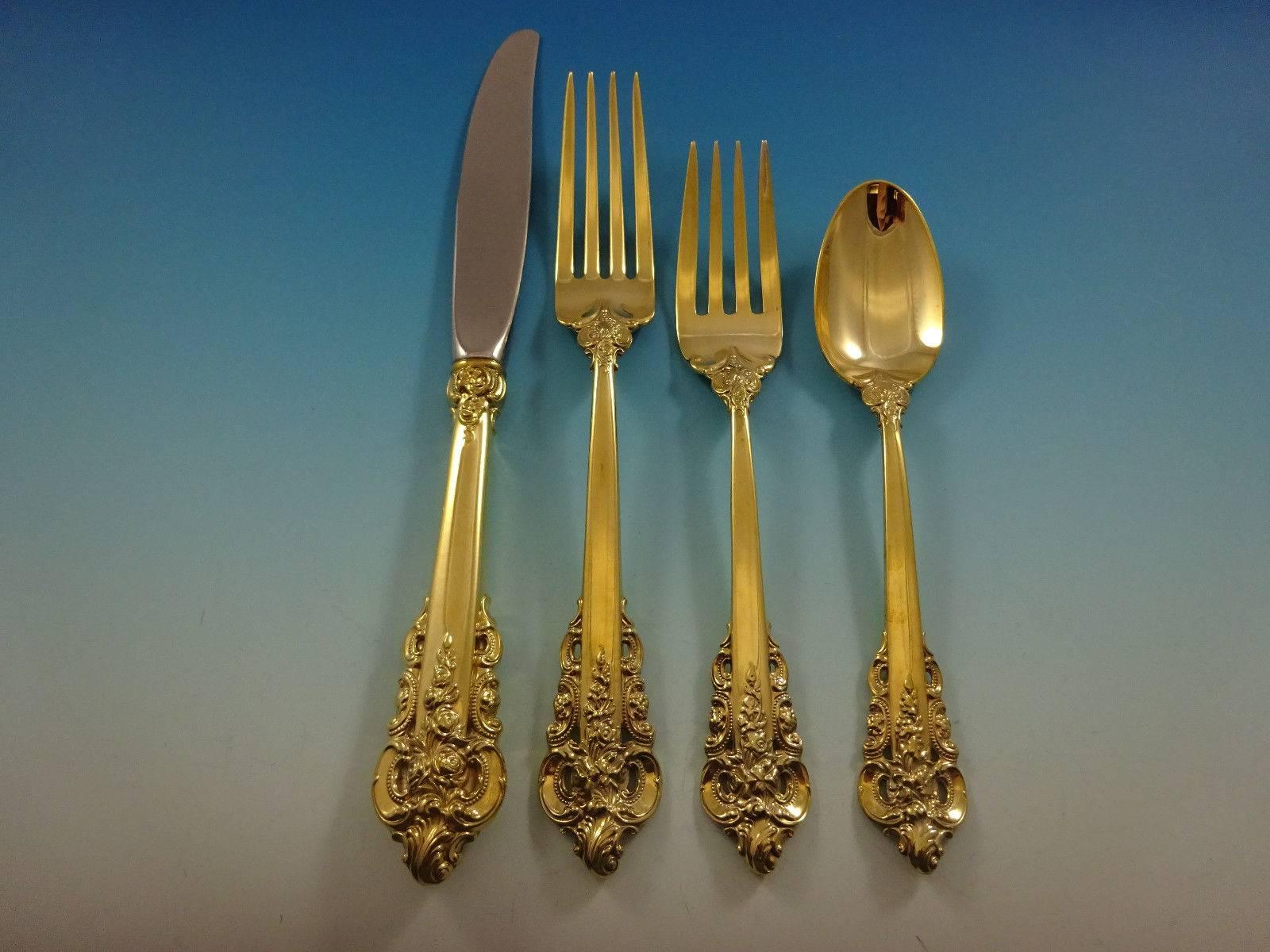 Grande Baroque by Wallace Sterling Silver flatware set - 32 pieces. Gold flatware is on trend and makes a bold statement on your table, especially when paired with gold rimmed china and gold accents. 

This set is vermeil (completely gold-washed)