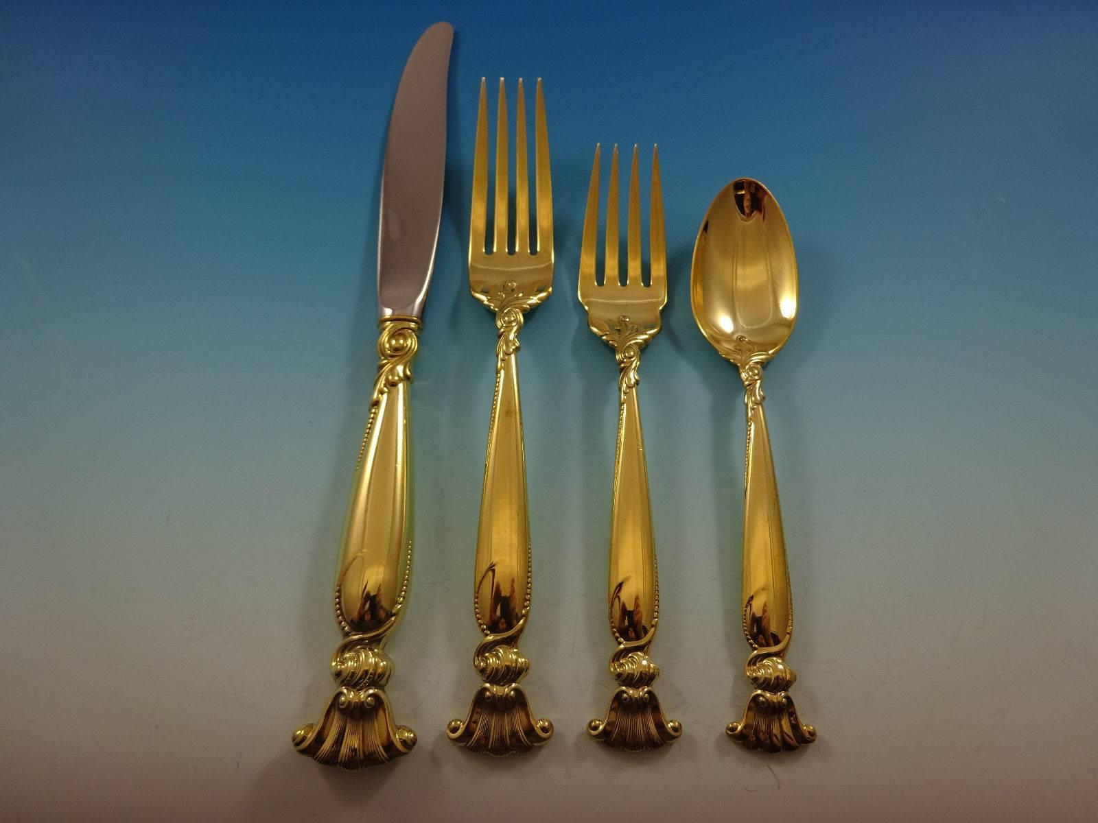 Fabulous Romance of the Sea Gold by Wallace Sterling Silver flatware set of 48 pieces. Gold flatware is on trend and makes a bold statement on your table. 

This set is vermeil (completely gold-washed) and includes:

12 Kknives, 9