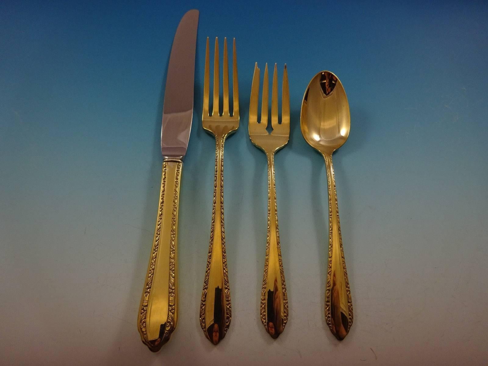 Gorgeous wild flower gold by Royal Crest sterling silver flatware set of 48 pieces. Gold flatware is on trend and makes a bold statement on your table. 

This set is vermeil (completely gold-washed) and includes:
 
12 knives, 9 1/8