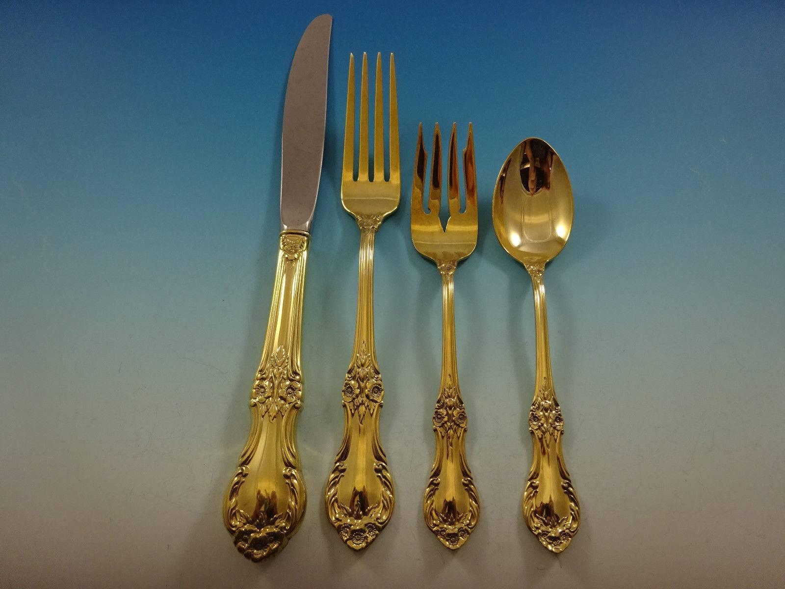 Gorgeous wild rose gold by International sterling silver flatware set - 48 pieces. Gold flatware is on trend and makes a bold statement on your table. 

This set is vermeil (completely gold-washed) and includes:
 
12 Knives, 9 3/8