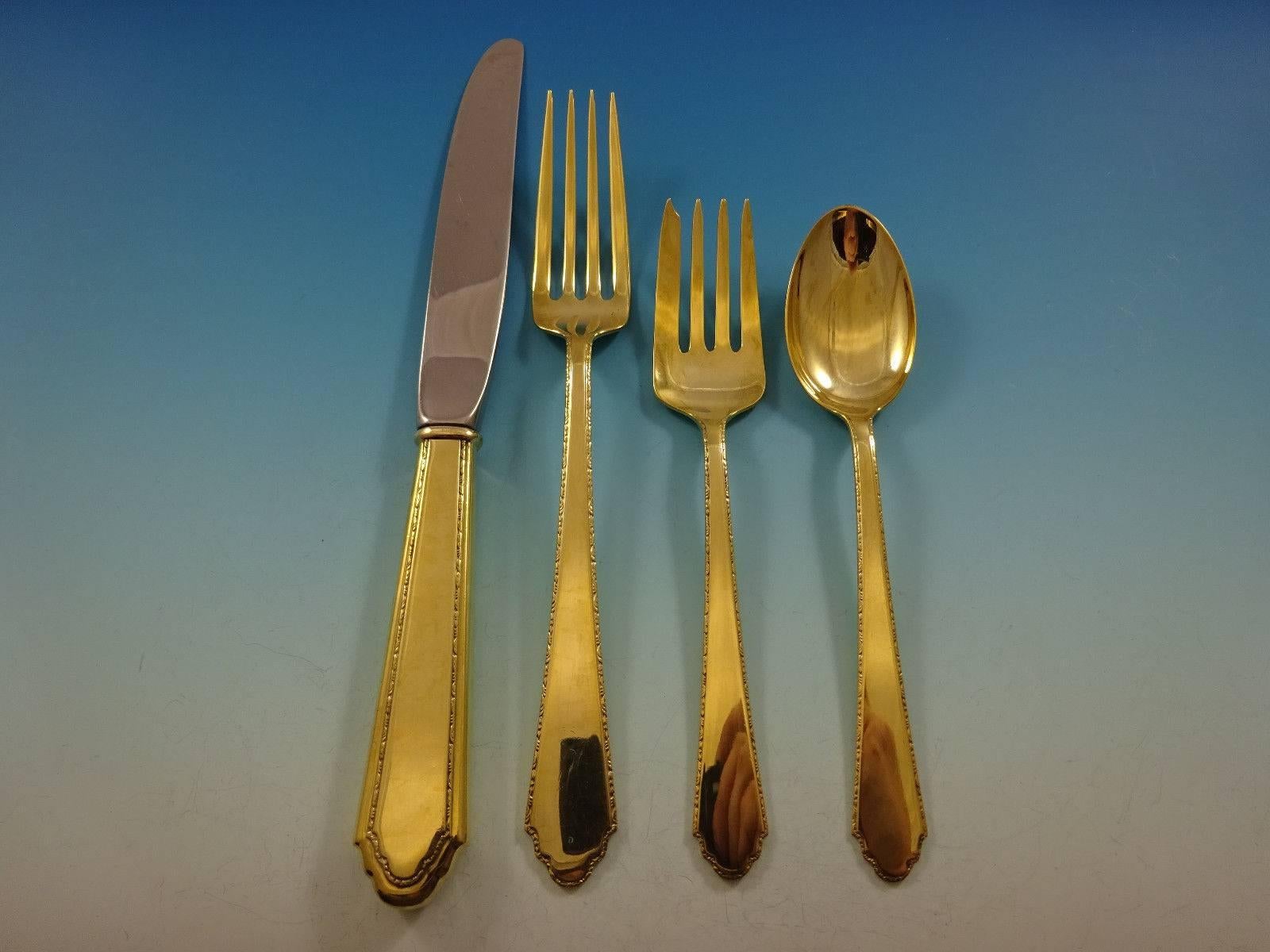 Gorgeous William and Mary Gold by Lunt Sterling Silver flatware set, 48 pieces. Gold flatware is on trend and makes a bold statement on your table. 

This set is vermeil (completely gold-washed) and includes:

12 knives, 8 5/8