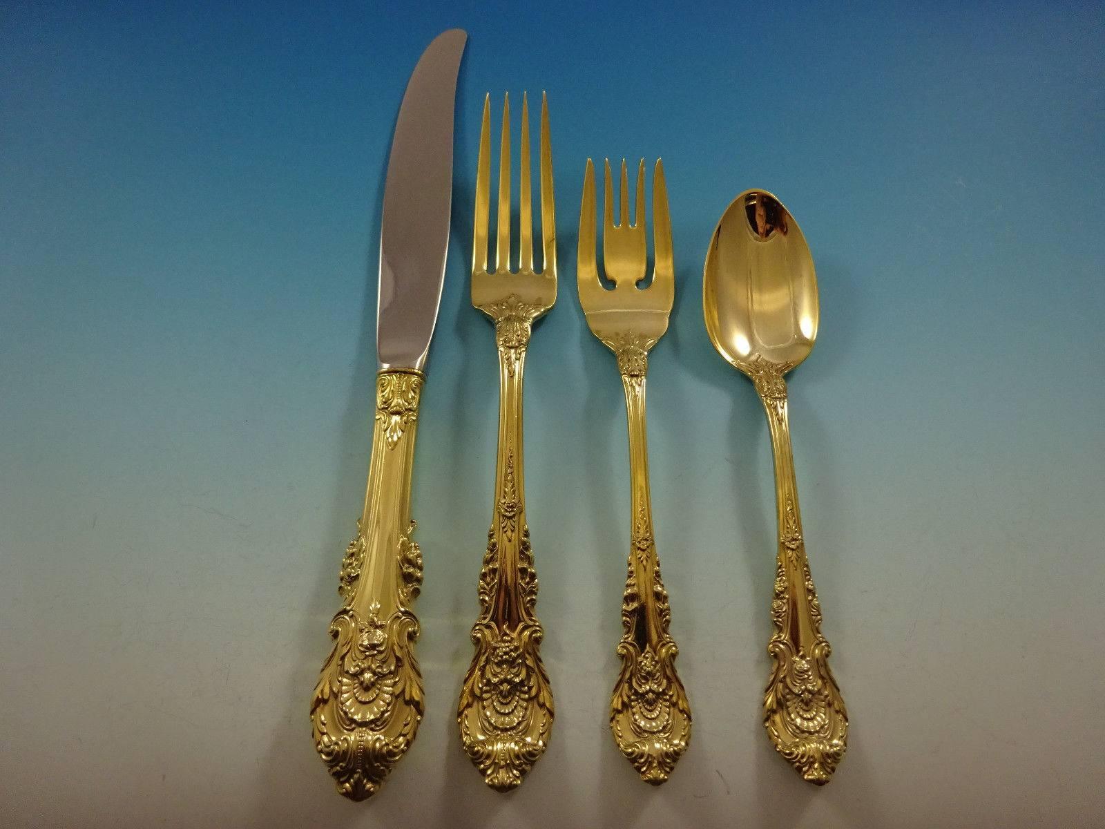 Gorgeous Sir Christopher Gold by Wallace sterling silver flatware set of 48 pieces. Gold flatware is on trend and makes a bold statement on your table. 

This set is vermeil (completely gold-washed) and includes:
 
12 knives, 9 1/8