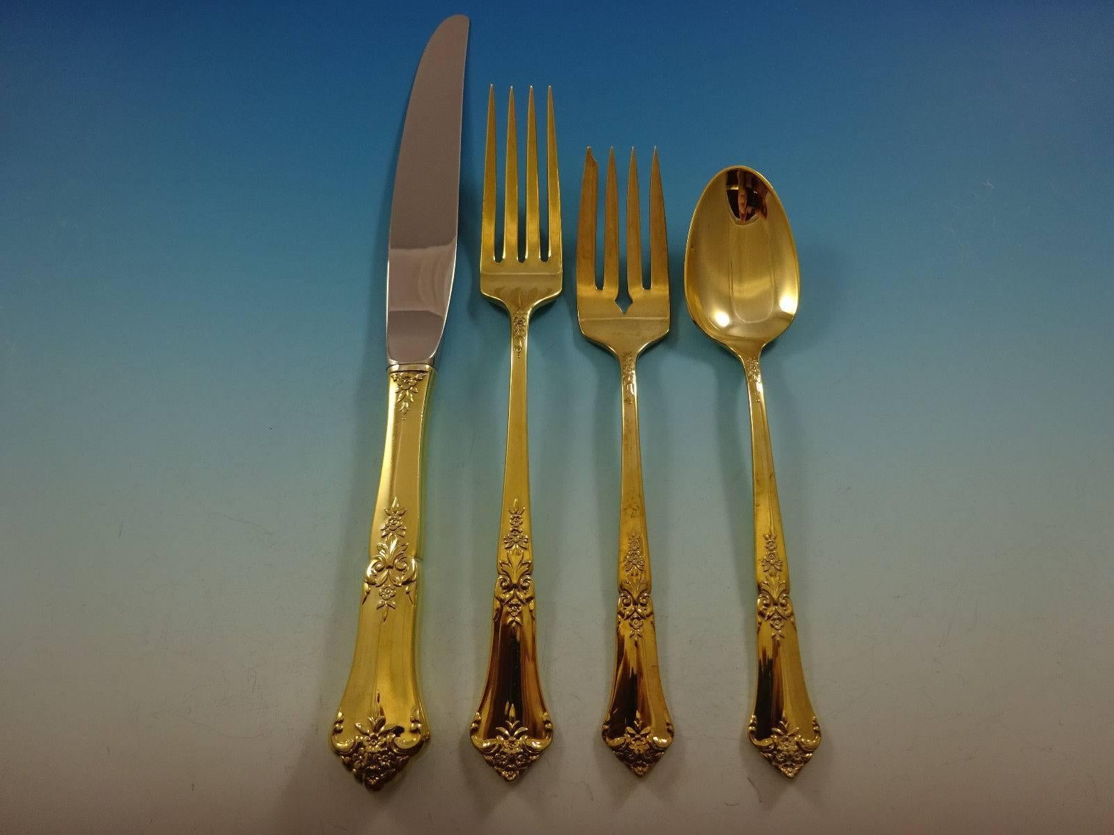 Gorgeous stately gold by State House sterling silver flatware set - 48 pieces. Gold flatware is on trend and makes a bold statement on your table. 

This set is vermeil (completely gold-washed) and includes:
 
12 Knives, 9 1/8