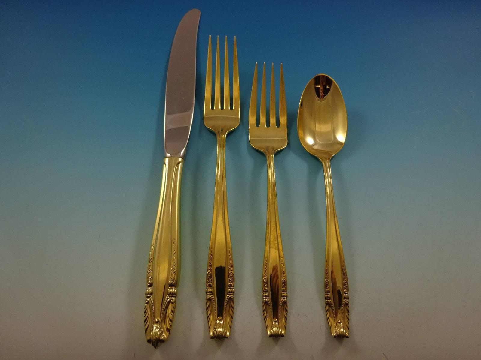 Gorgeous Stradivari gold by Wallace Sterling Silver flatware set 48 pieces. Gold flatware is on trend and makes a bold statement on your table. 

This set is vermeil (completely gold-washed) and includes:
 
12 knives, 9 1/8