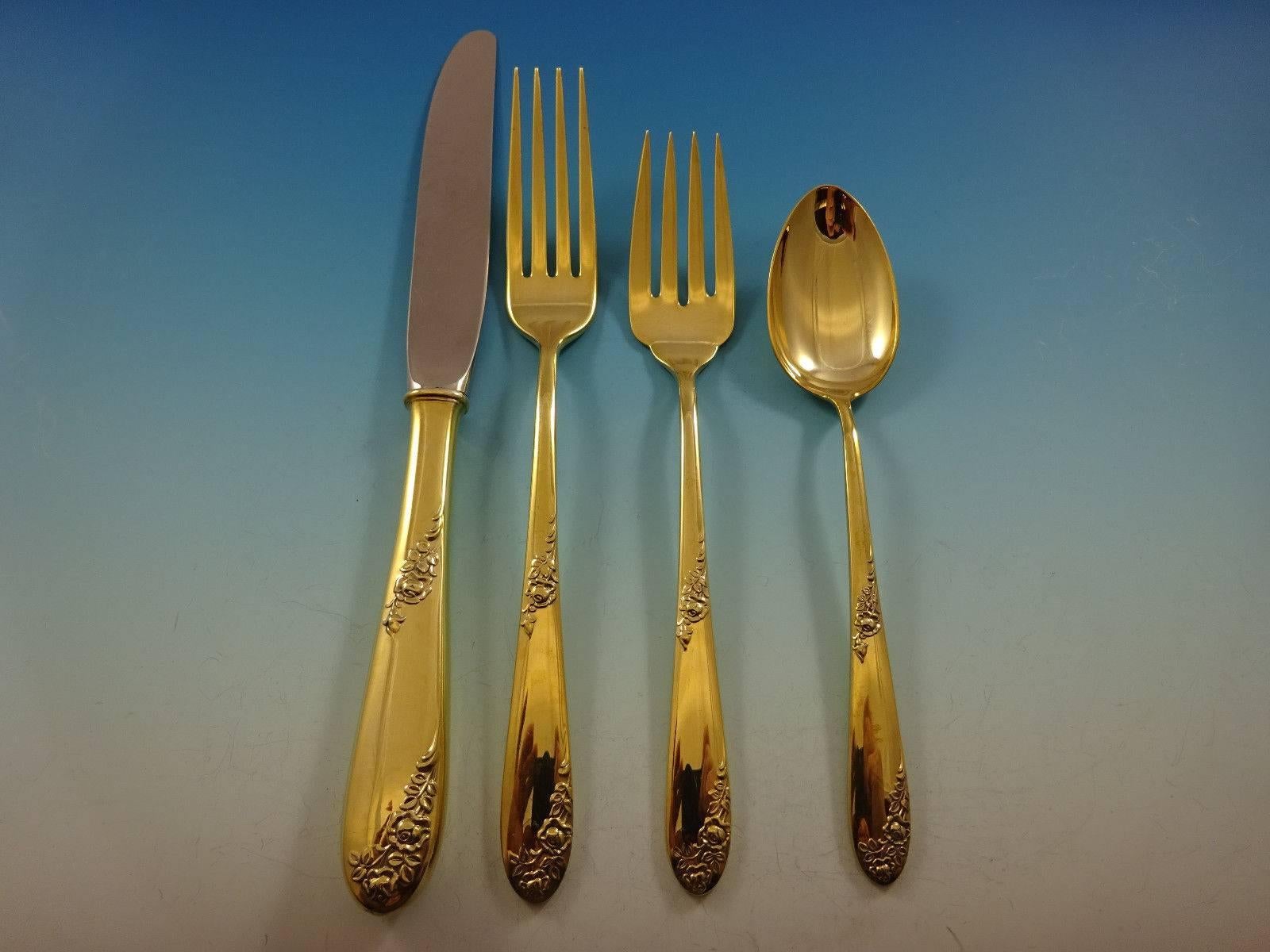 Gorgeous Sweetheart Rose by Lunt sterling silver flatware set - 48 pieces. Gold flatware is on trend and makes a bold statement on your table. 

This set is vermeil (completely gold-washed) and includes:
 
12 Knives, 8 7/8