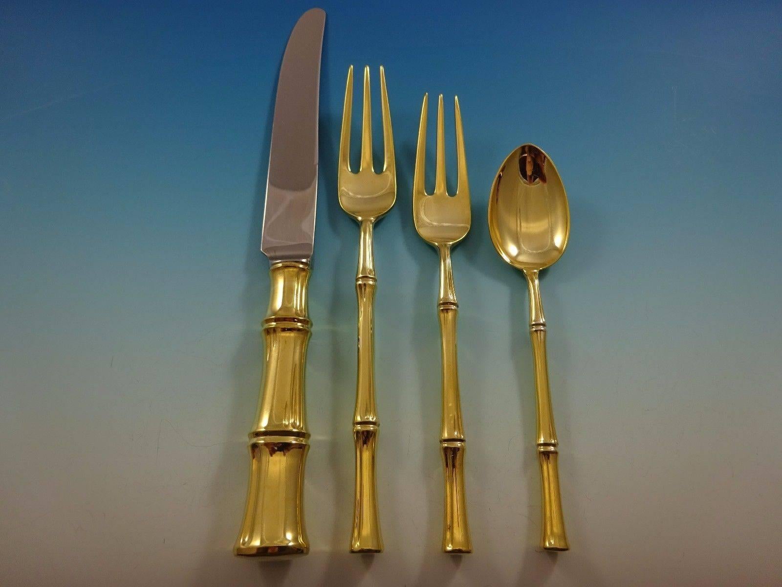 Bamboo Gold by Tiffany Sterling silver flatware set of 24 pieces. Gold flatware is on trend and makes a bold statement on your table. 

This set is vermeil (completely gold-washed) and includes:
 
 
Six knives, 9 3/8