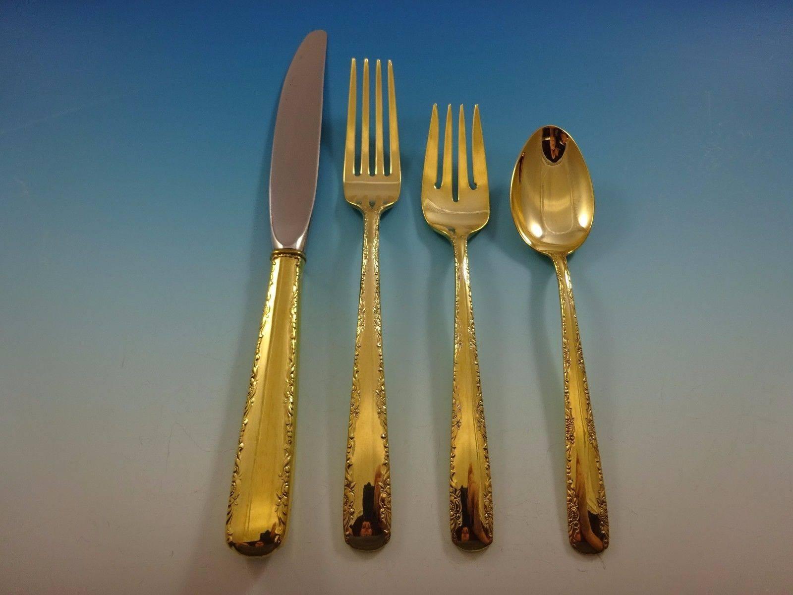 Elegant Camellia gold by Gorham Sterling Silver flatware set 48 pieces. Gold flatware is on trend and makes a bold statement on your table. 

This set is vermeil (completely gold-washed) and includes:
 
12 knives, 8 3/4