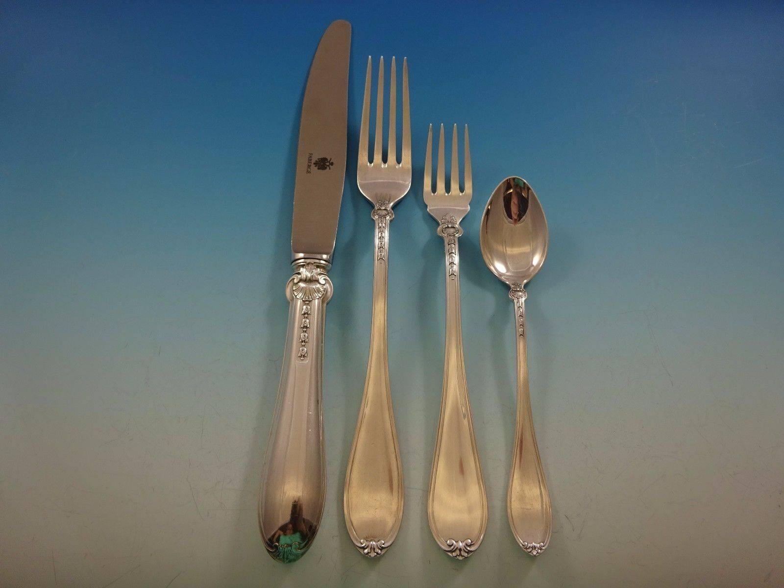 Rare Gatchina Palace by Faberge sterling silver dinner size flatware set of 63 pieces. Fabergé is known as the most revered name in luxury. 

This set includes:

12 dinner knives, 9 3/4
