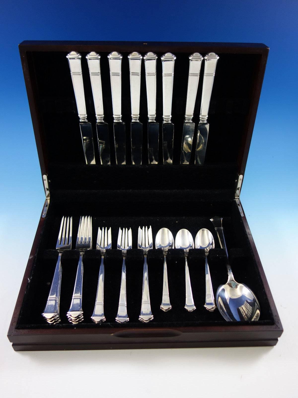 This set includes:

Eight dinner size knives, 10 1/4