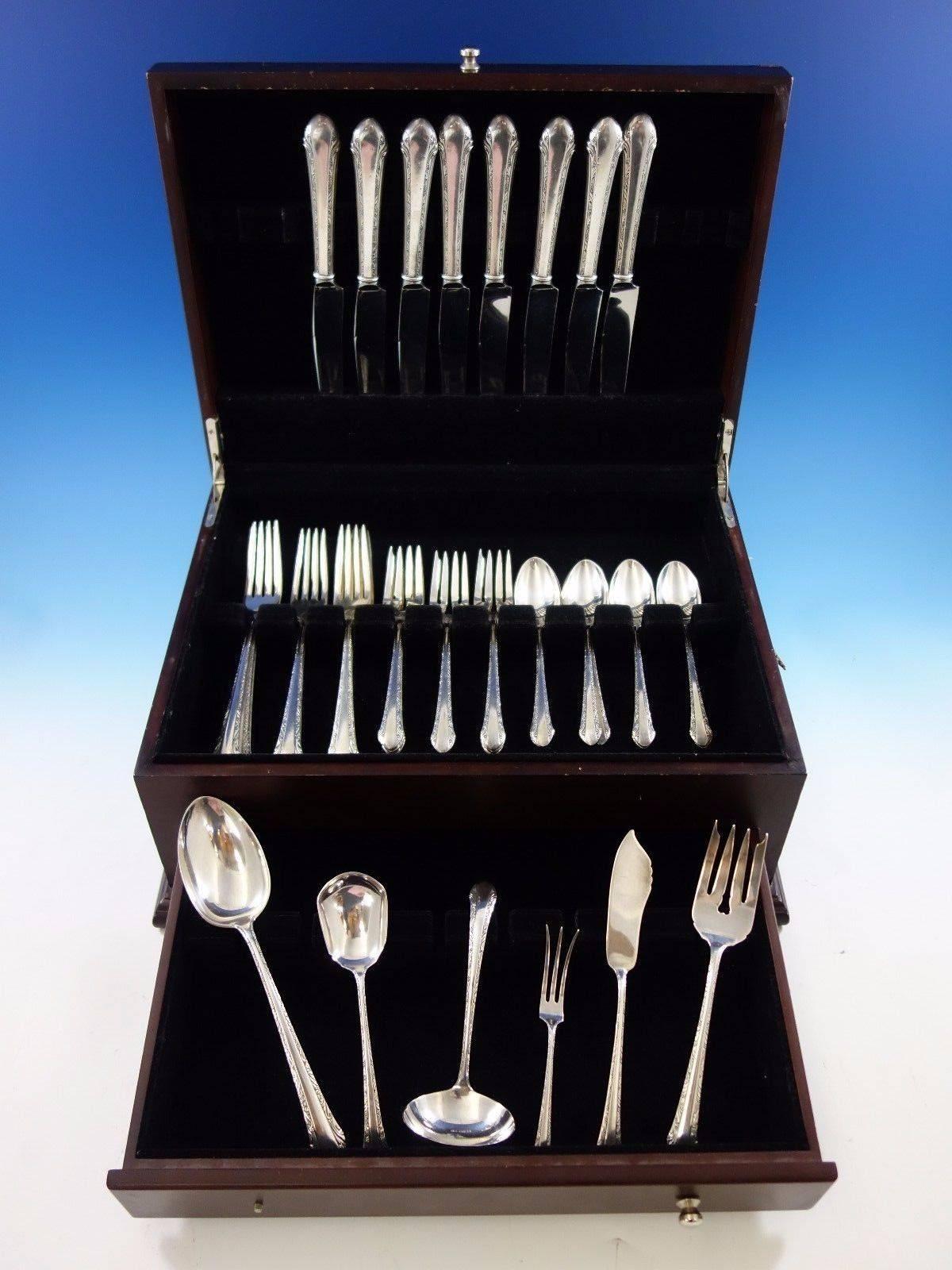Chased Romantique by Alvin sterling silver flatware set of 38 pieces. This set includes: 

Eight dinner knives, 9 5/8