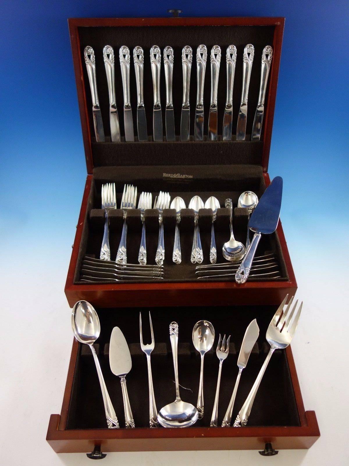 Spring glory by international service de couverts en argent sterling de 80 pièces. Cet ensemble comprend : 

12 couteaux, 9
