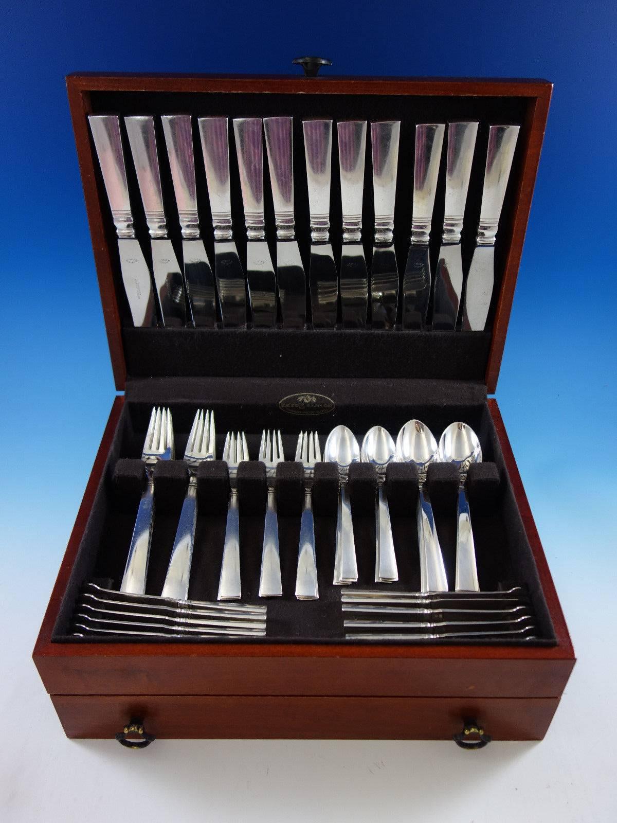 Blok by Georg Jensen sterling silver dinner size flatware set - 72 pieces. This set has scarce extra large dinner knives and forks! This set includes: 

12 extra large dinner knives, 9 3/4