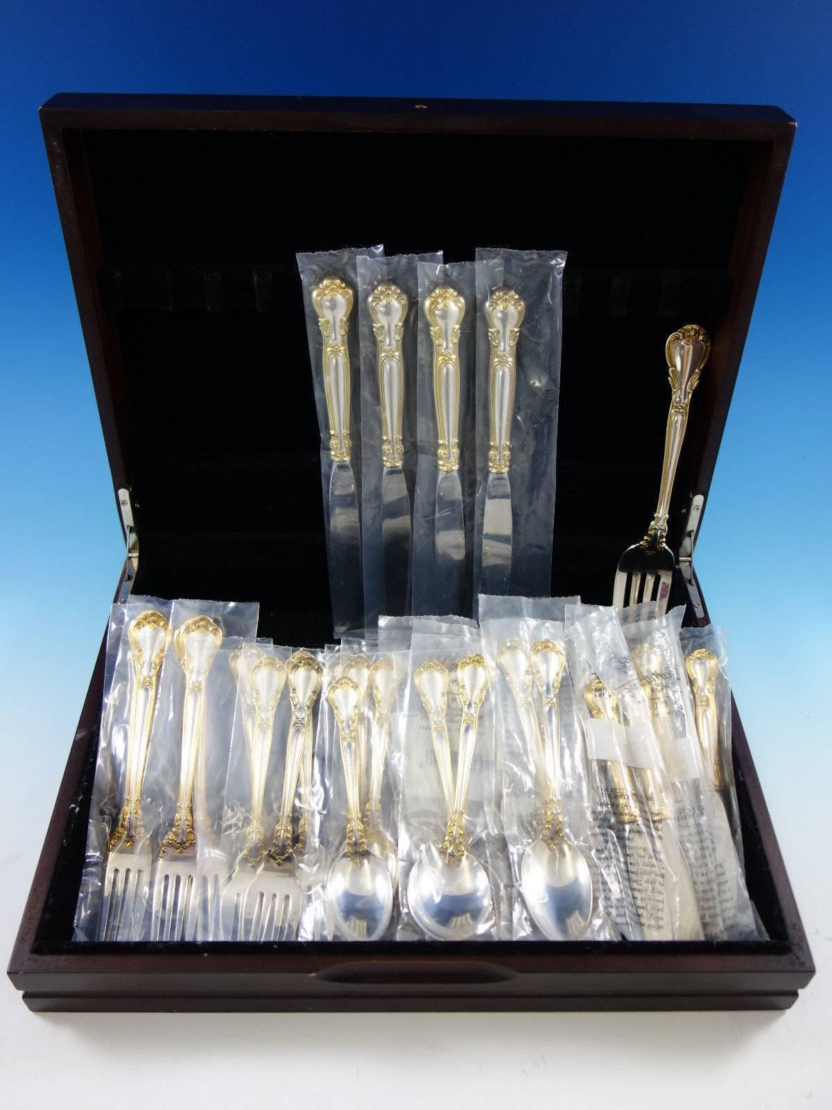 Unused place size Chantilly with gold accent by Gorham sterling silver flatware set, 29 pieces. Great starter set! This set includes: Four place size knives, 9 1/4
