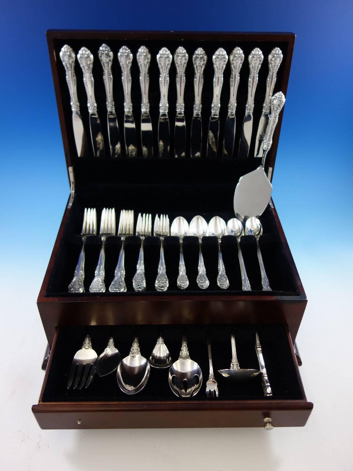 Dinner size king Edward by Gorham sterling silver flatware set - 69 pieces. This set includes: 

12 dinner size knives, 9 3/4