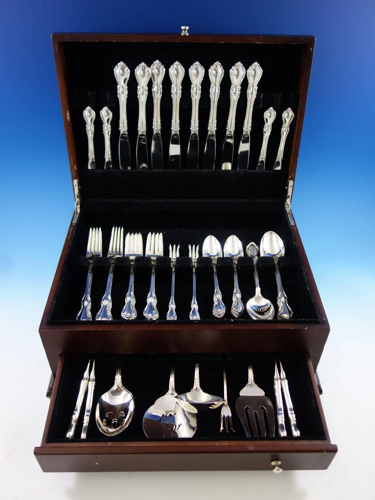 Hampton court by Reed and Barton sterling silver flatware set of 62 pieces. This set includes: 

Eight knives, 9 1/8
