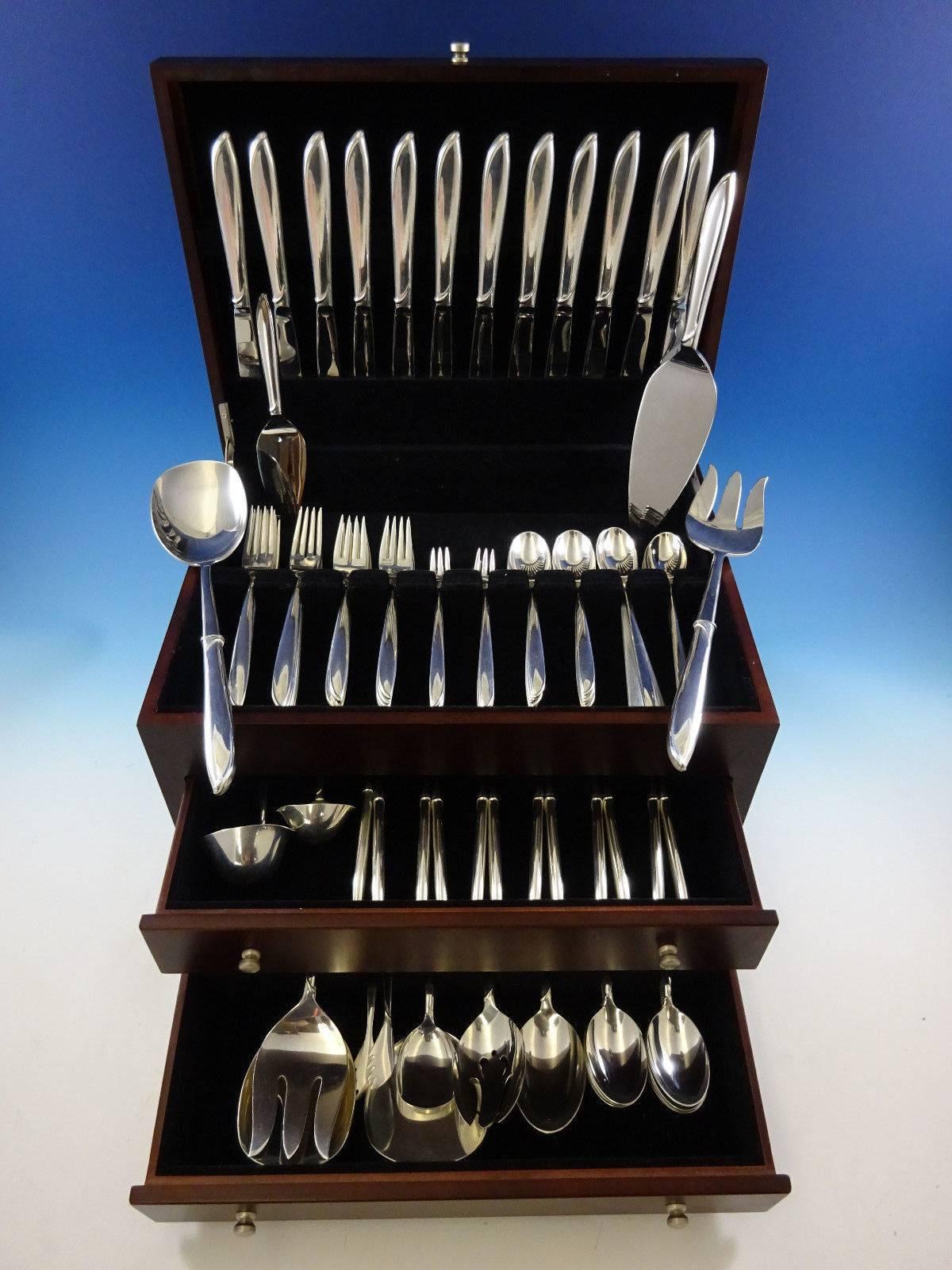 Mid-Century Modern Silver Rhythm by International sterling silver flatware set of 110 pieces. This set includes: 

12 knives, 9 1/4