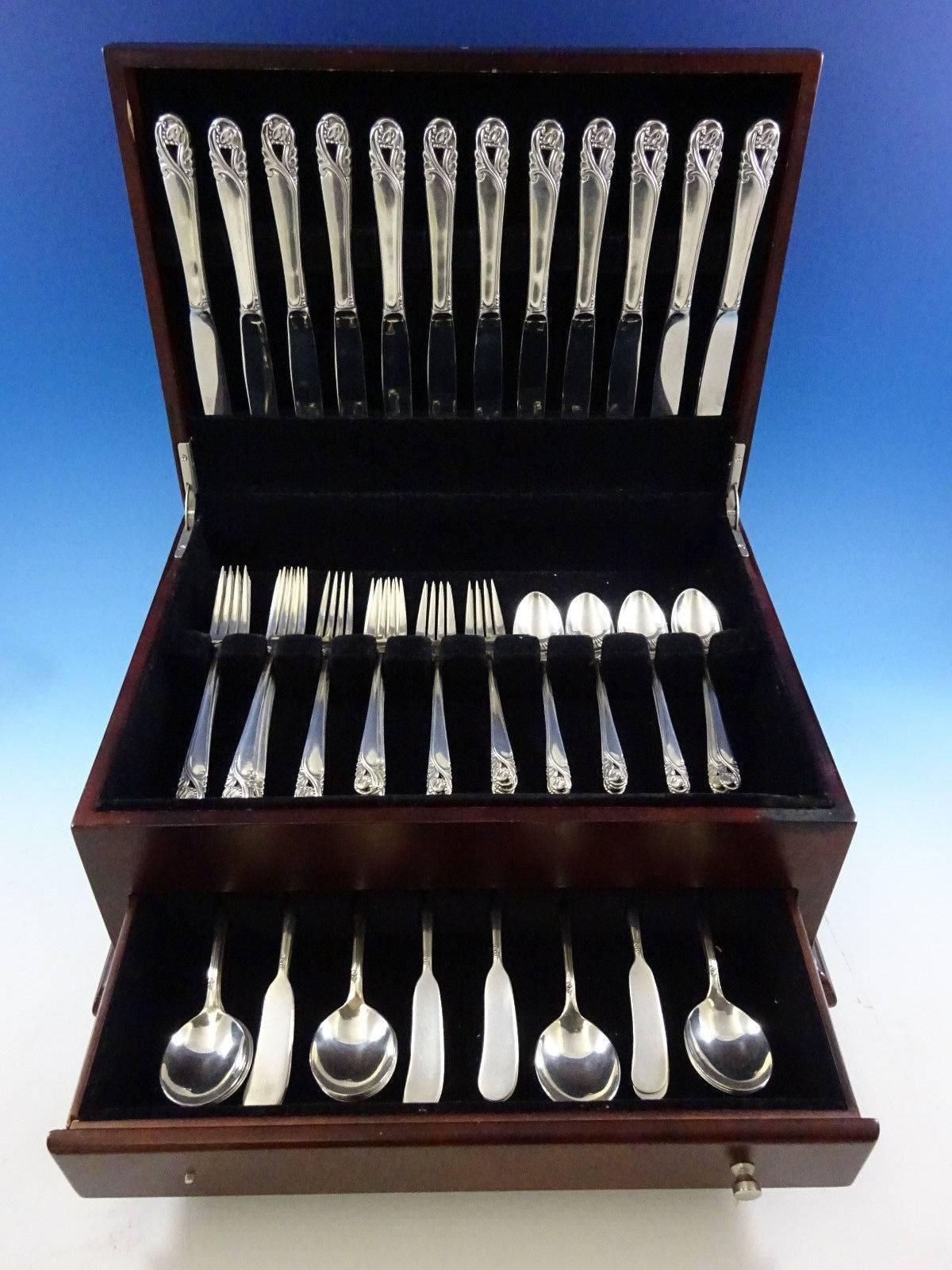 Spring Glory by International Sterling Silver flatware set - 72 pieces. This set includes: 

12 knives, 9 1/4