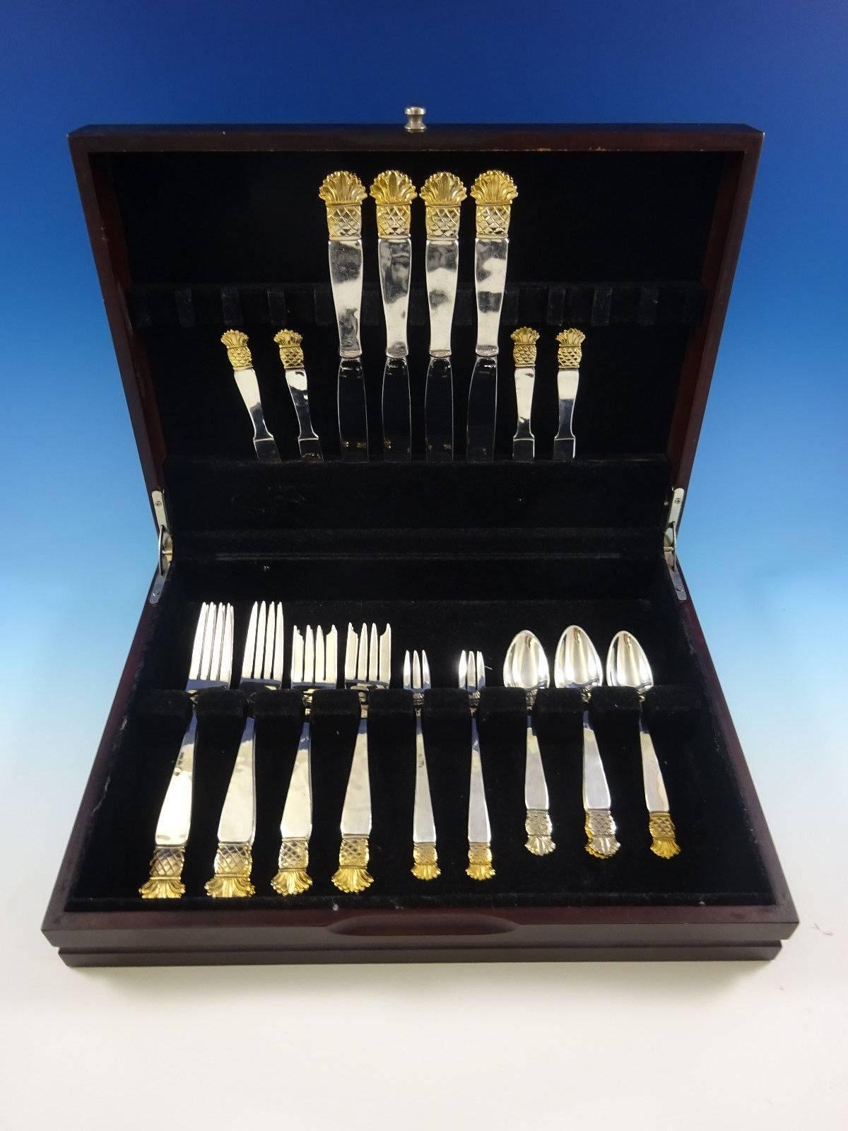 Rare 24 piece sterling silver set of Grenada with gold accent made by Old Newbury Crafters. Great starter set! It is beautifully hand wrought and heavy. The set includes: 

Four dinner size knives, solid handle, 9 5/8