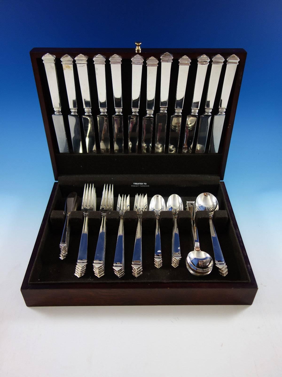 Hampton by Tiffany and Co. sterling silver dinner size flatware set, 72 pieces. this set includes: 12 dinner size knives, 10 1/8", 12 dinner size forks, 7 3/4", 12 salad forks, 6 7/8", 12 teaspoons, 6", 12 cream soup spoons,