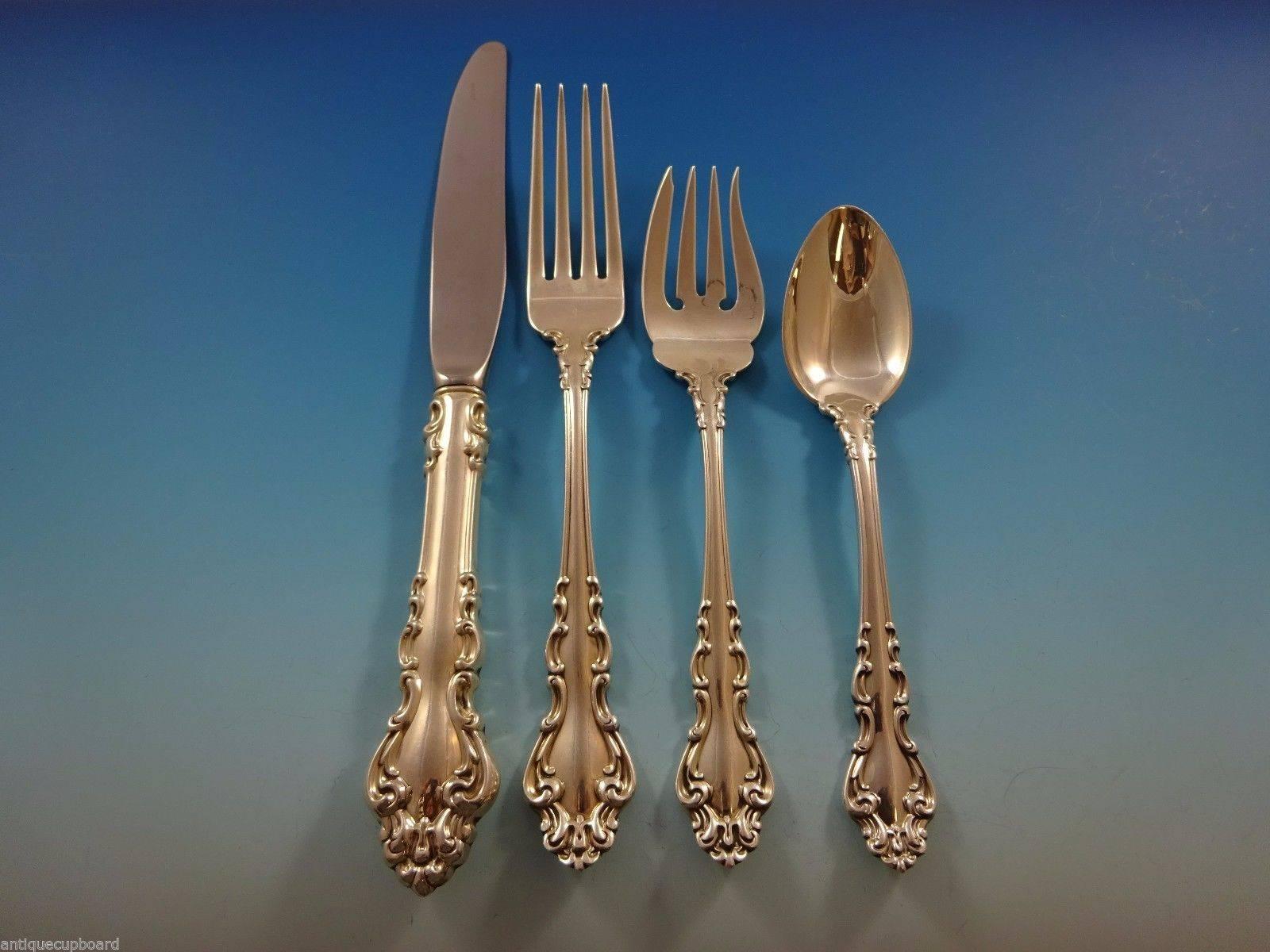 Spanish Baroque by Reed & Barton sterling silver flatware set 52 pieces. This set includes: 

12 knives, 9 1/8