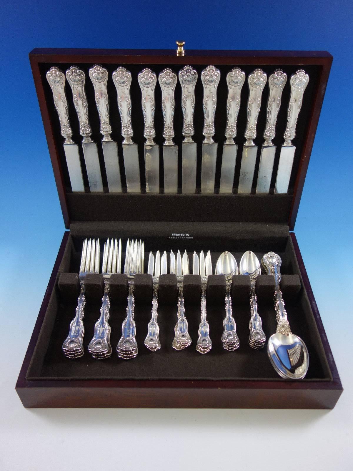 Dinner size imperial queen sterling silver flatware set with shell motif, 54 pieces. This set includes: 

12 dinner size knives, blunt silver plated blades (some light edge wear), 9 1/2