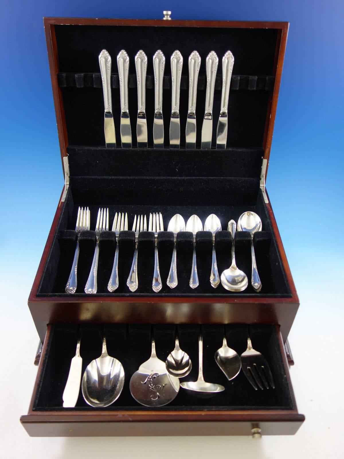 Dancing flowers by Reed and Barton sterling silver flatware set of 47 pieces. This set includes: 

Eight knives, 8 7/8