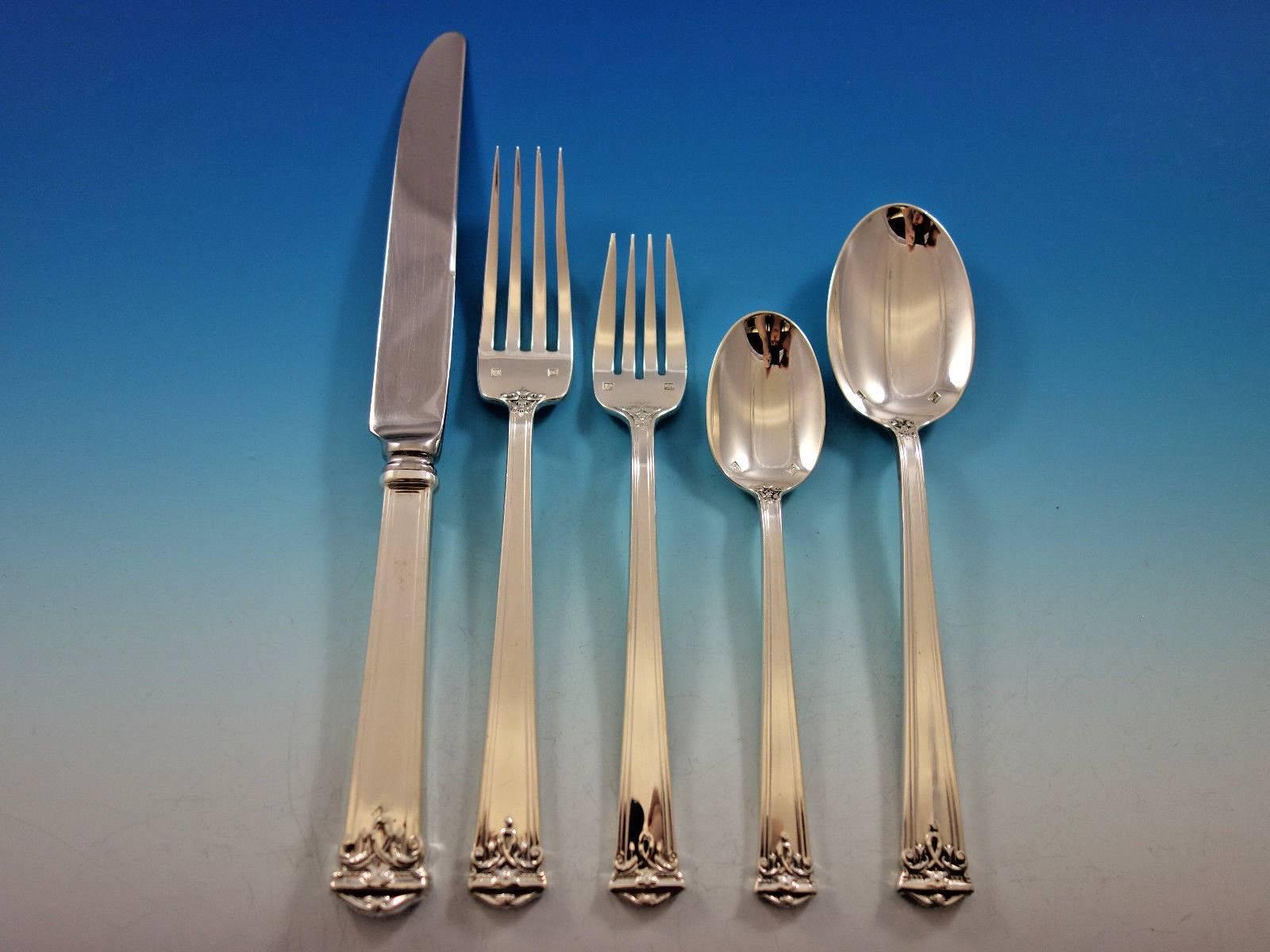 Large and heavy Trianon by Tuttle sterling silver flatware set for 18-90 pieces. This set includes: 16 dinner size knives, 9 3/4", 16 dinner size forks, 7 7/8", 16 salad forks, 7", 16 teaspoons, 5 7/8", 16 place soup spoons, 7