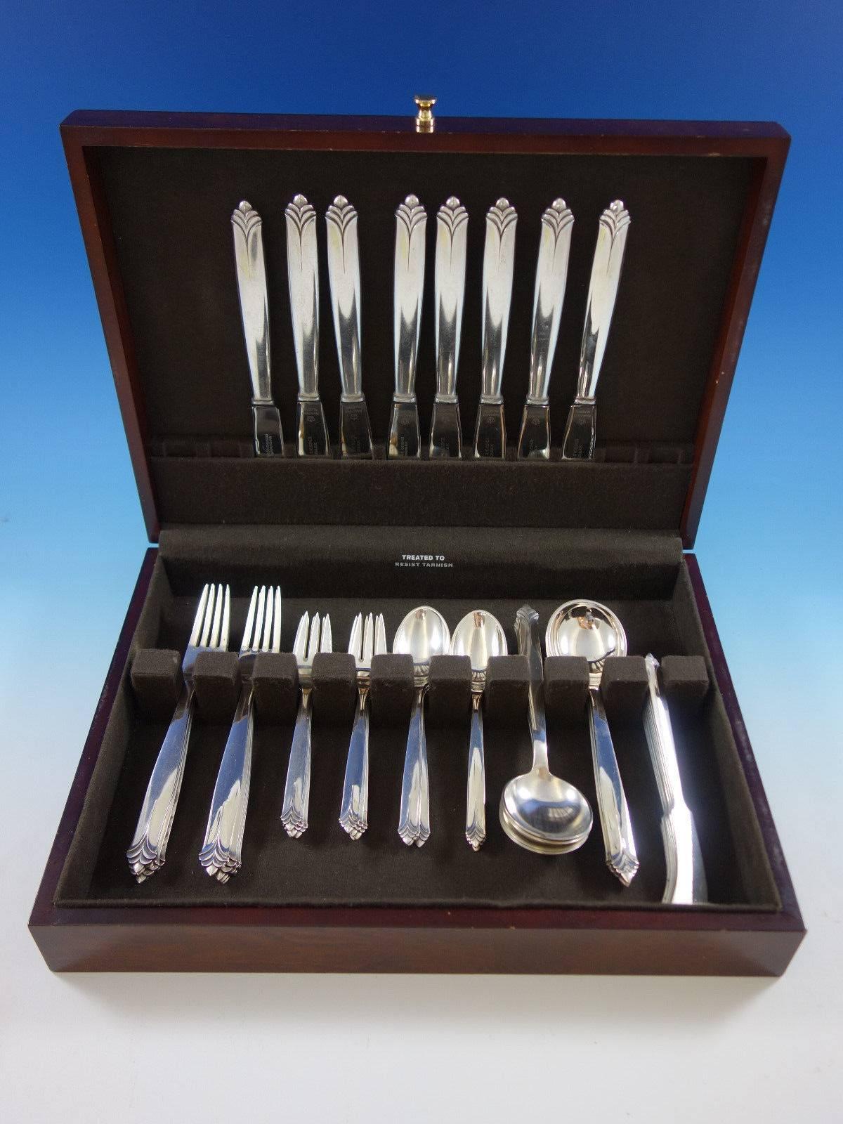 Rare tropic AKA #37 by Evald Nielsen Danish sterling silver art deco flatware set - 48 pieces. This pattern was designed by Evald Nielsen's oldest son, silversmith Aage Weimar. This set includes: 

eight dinner knives, 7 -8 3/4