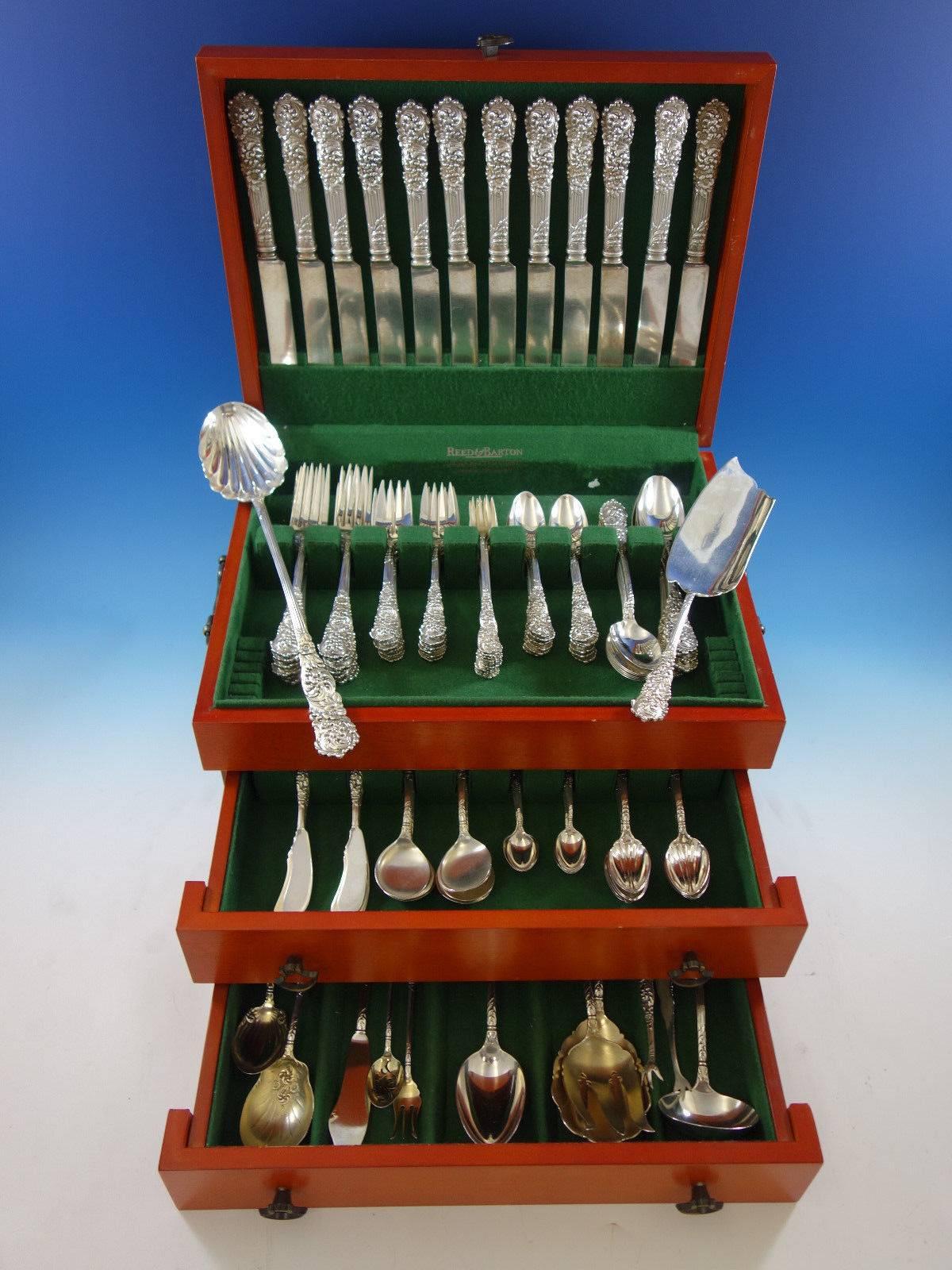 Trajan by Reed and Barton sterling silver flatware set with Rococo design - 132 pieces. This set includes: 

12 dinner size knives, 10 1/8