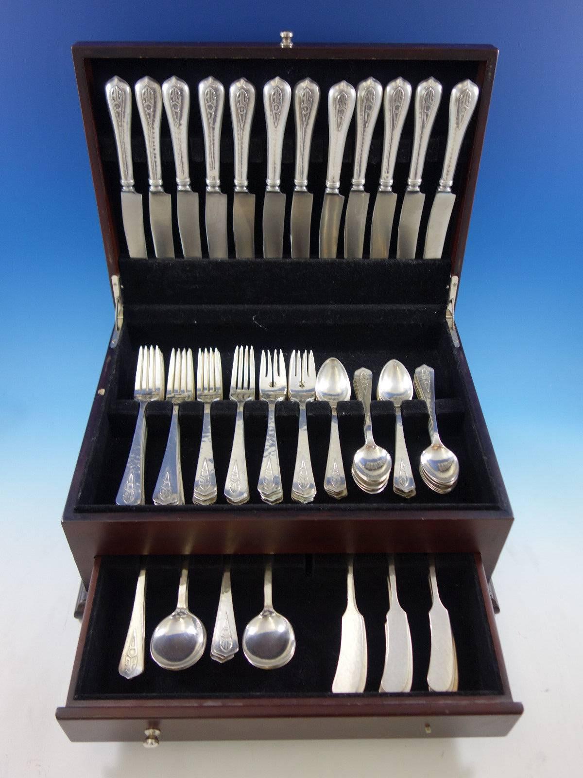 Chicago arts & crafts hand-wrought sterling silver flatware set by F. Novick of 96 pieces. This set includes: 12 dinner knives, 9 3/8