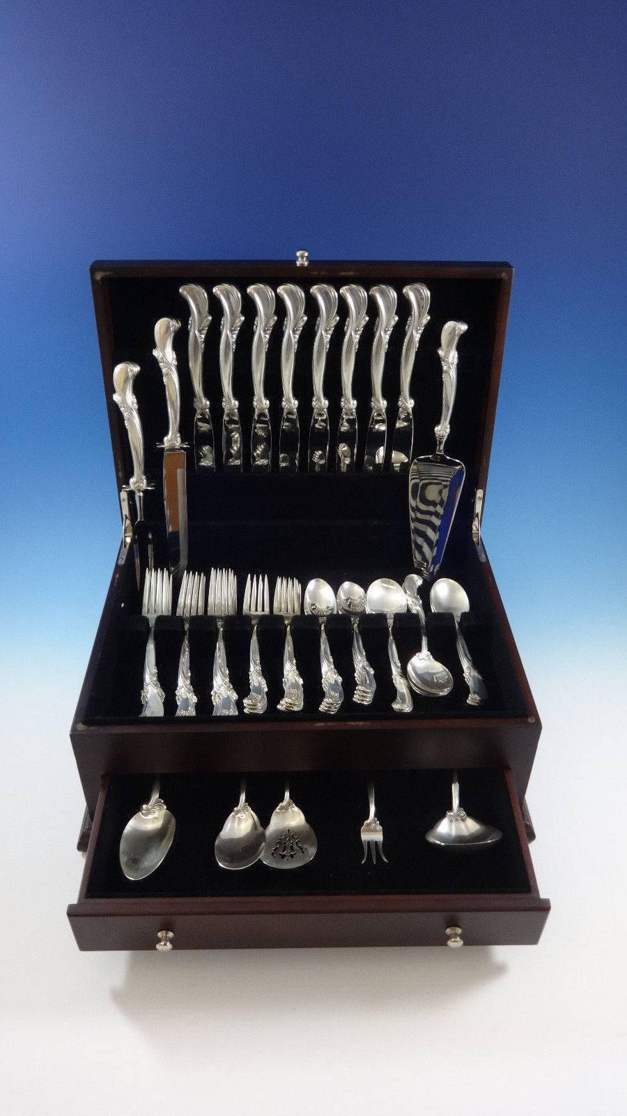 Waltz of Spring by Wallace sterling silver flatware set of 40 pieces. This dinner set includes: 

Eight dinner knives, 9 13/4