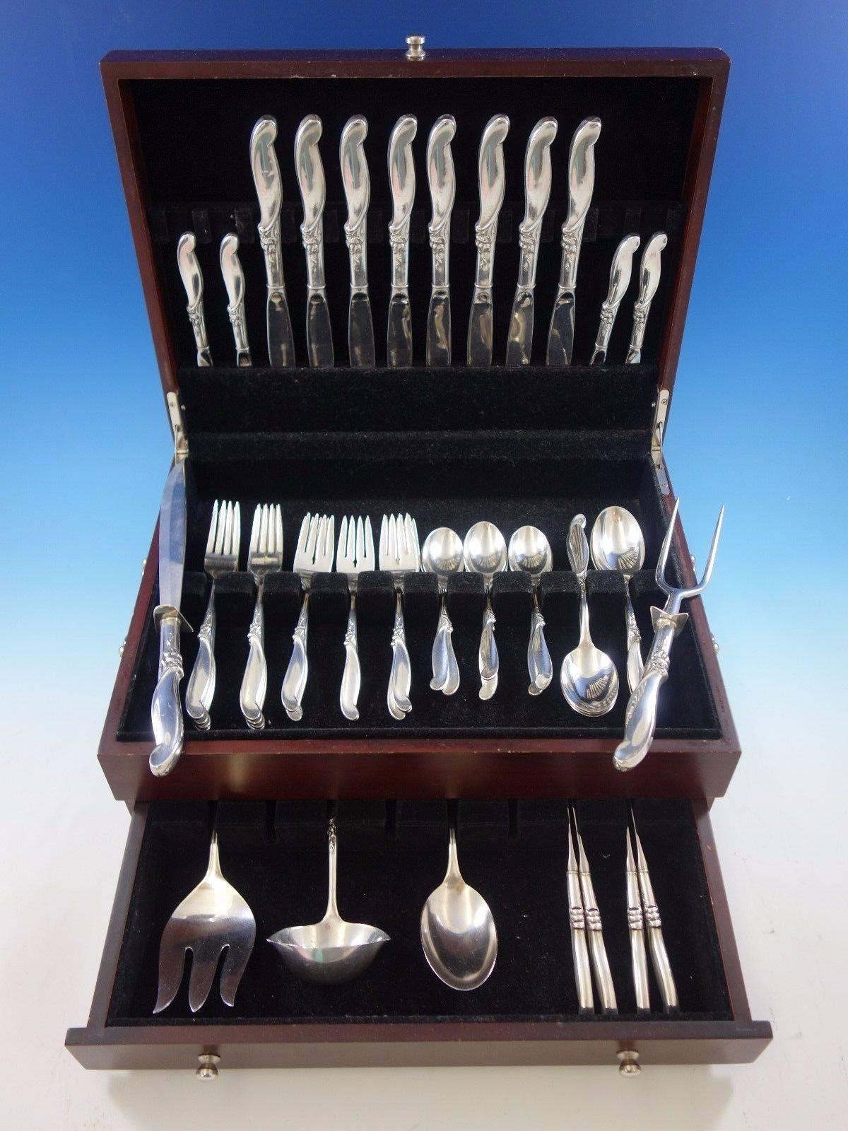 Silver Melody by International sterling silver flatware set, 53 pieces. This set includes: 

eight knives, 9 1/4