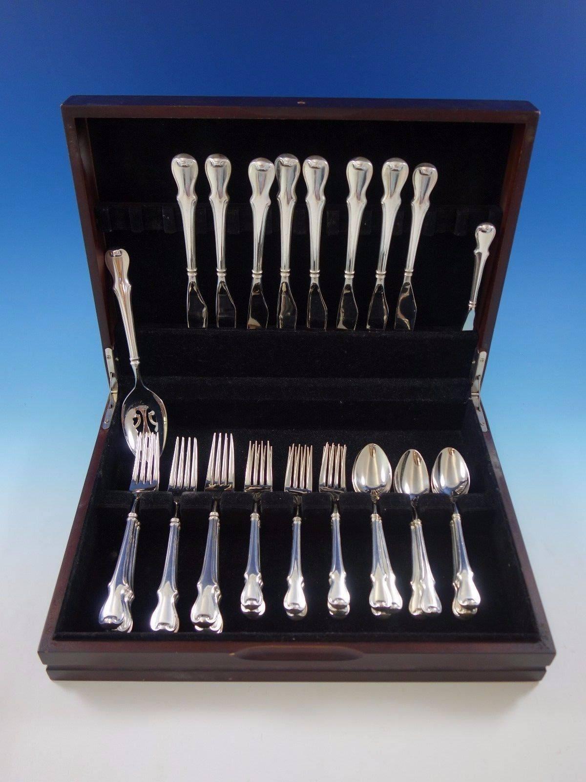Plymouth Colony by Wallace sterling silver Flatware set, 34 pieces. All pieces in this set have sterling silver hollow handles with stainless ends. This set includes: 

Eight knives, 8 7/8