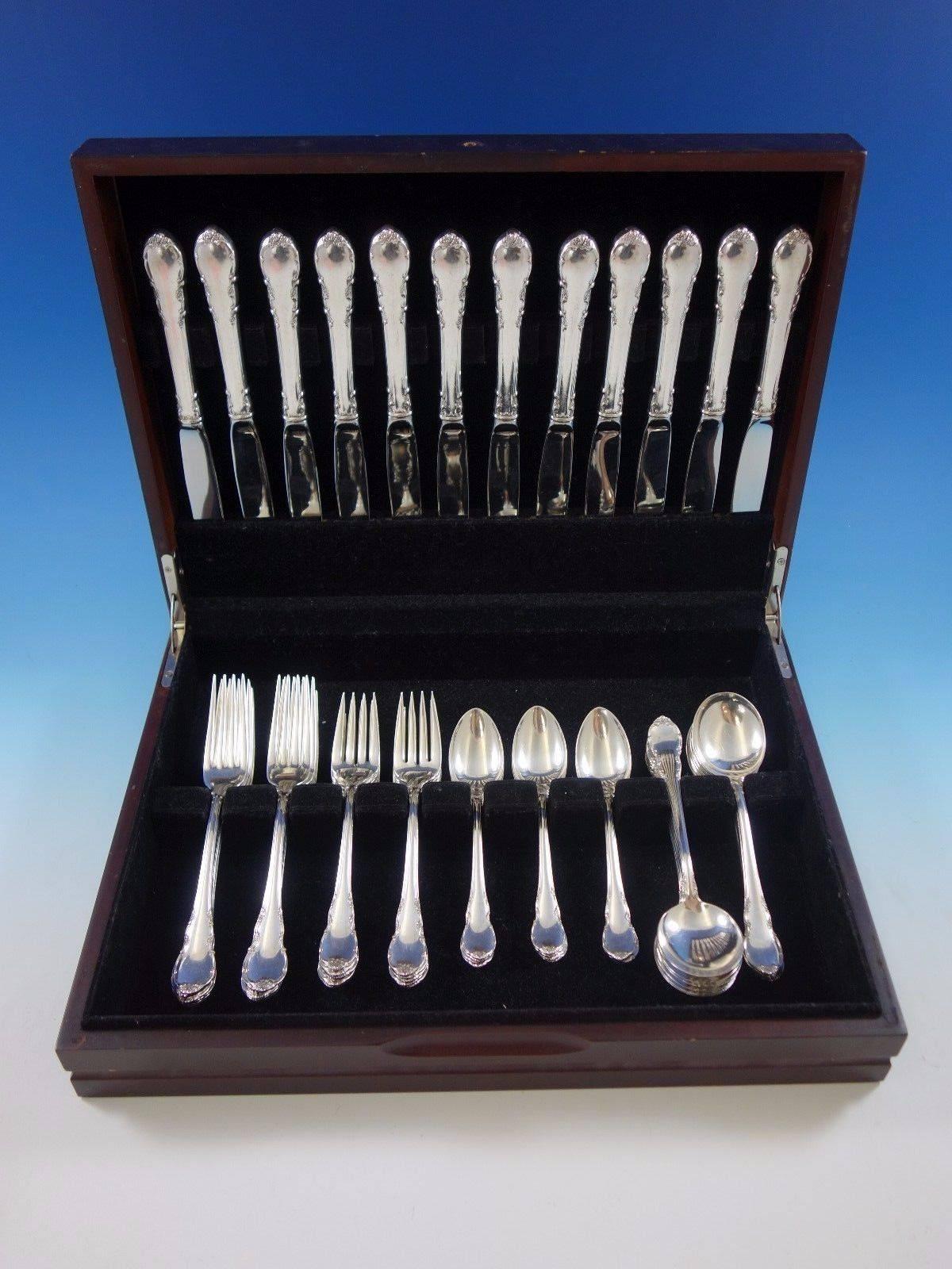 Modern Victorian by Lunt sterling silver flatware set, 60 pieces. This set includes: 

12 knives, 8 3/4