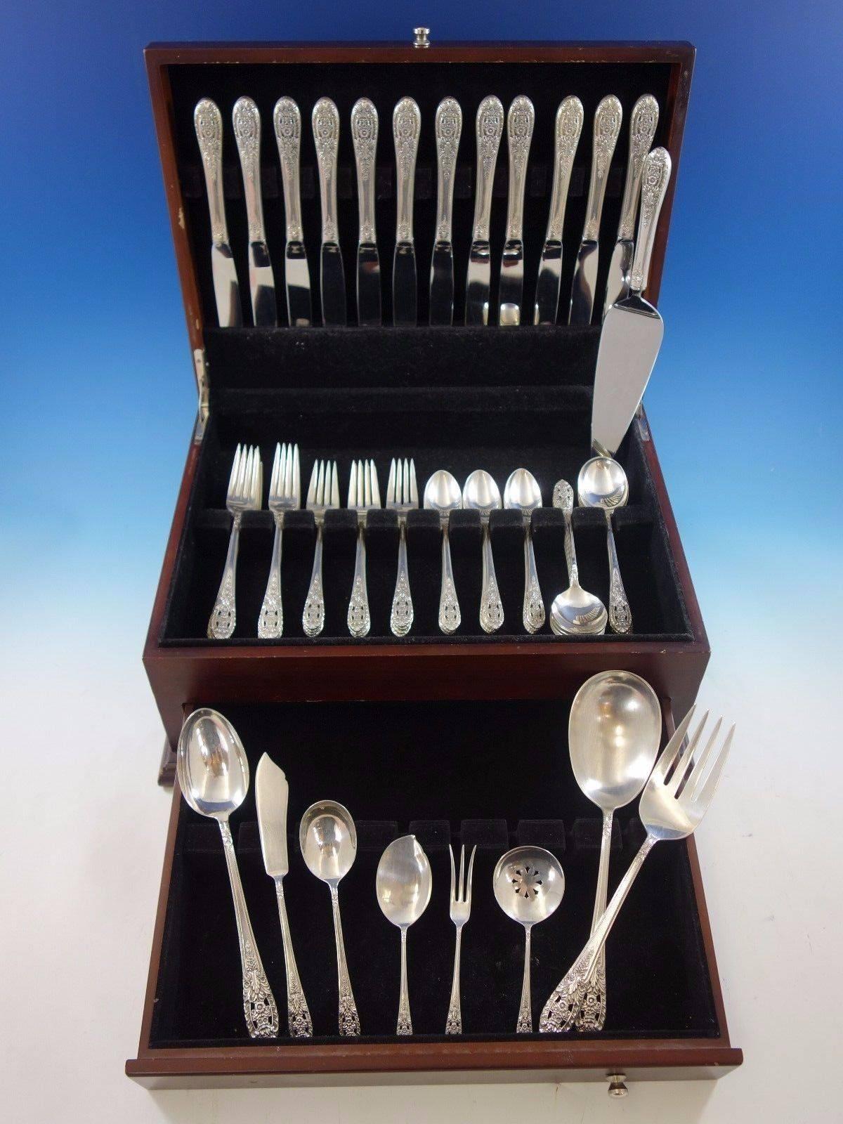 Crown Princess by Fine Arts International sterling silver flatware set, 69 pieces. This set includes: 

12 knives, 9 1/4