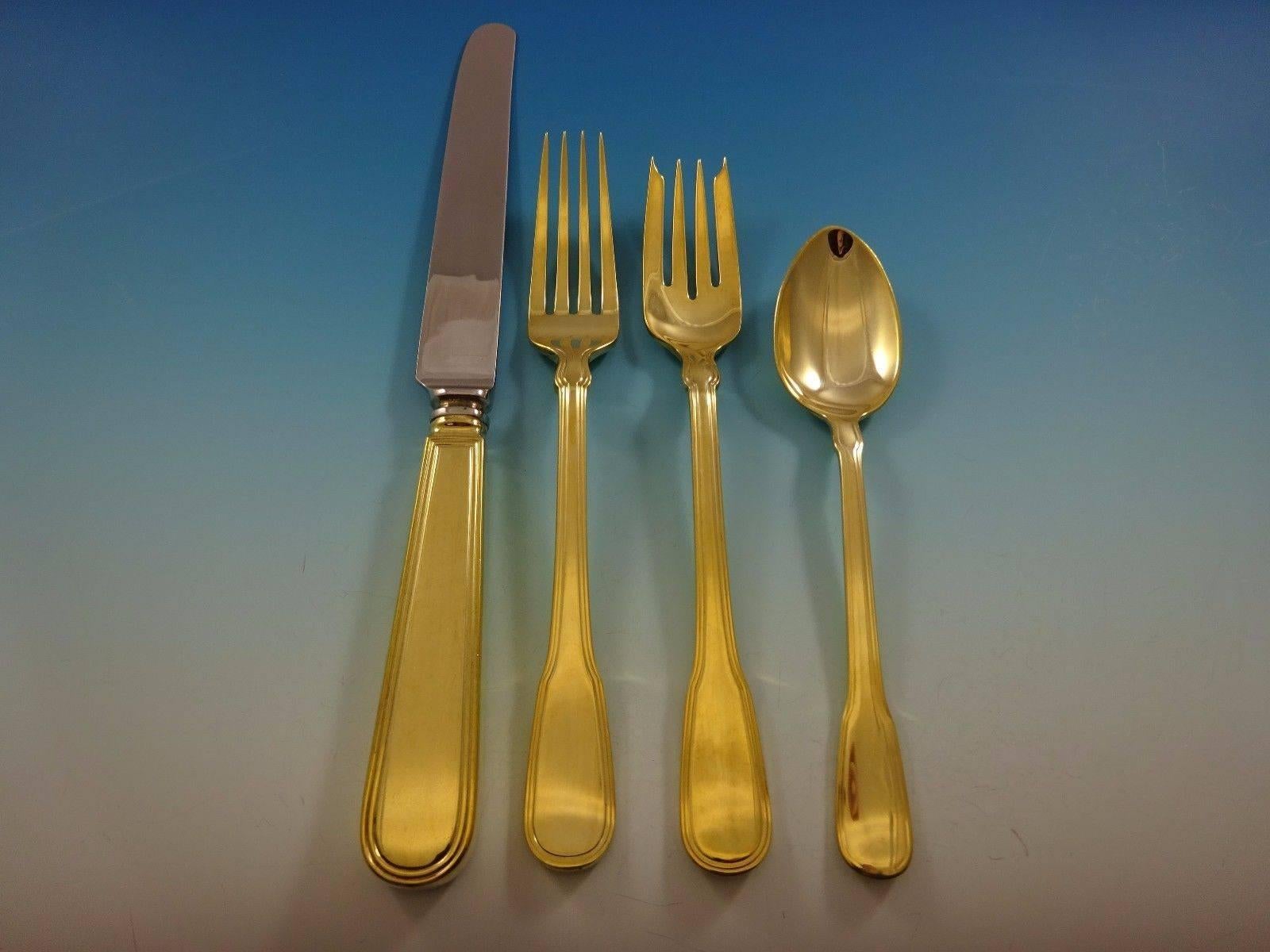 Hamilton Gold by Tiffany & Co. sterling silver flatware set of 24 pieces. This set is vermeil (completely gold-washed) and includes:

Six knives, 9 3/8