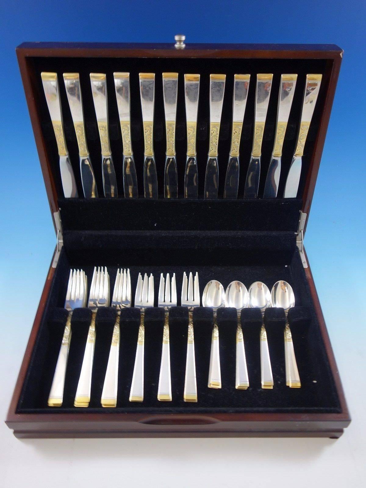 Golden scroll by Gorham sterling silver flatware set, 48 pieces. This set includes: 12 place knives, 9 1/8