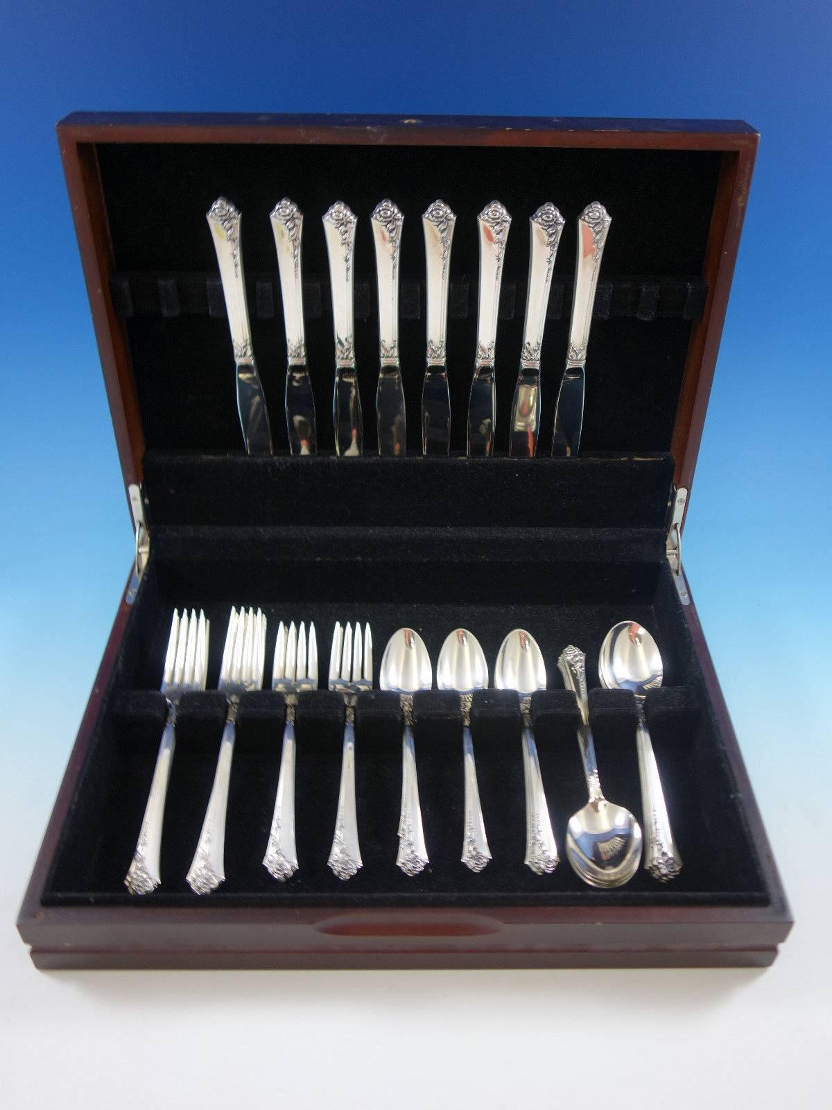 Damask Rose by Oneida sterling silver flatware set, 40 pieces. This set includes: 

eight knives, 8 3/4