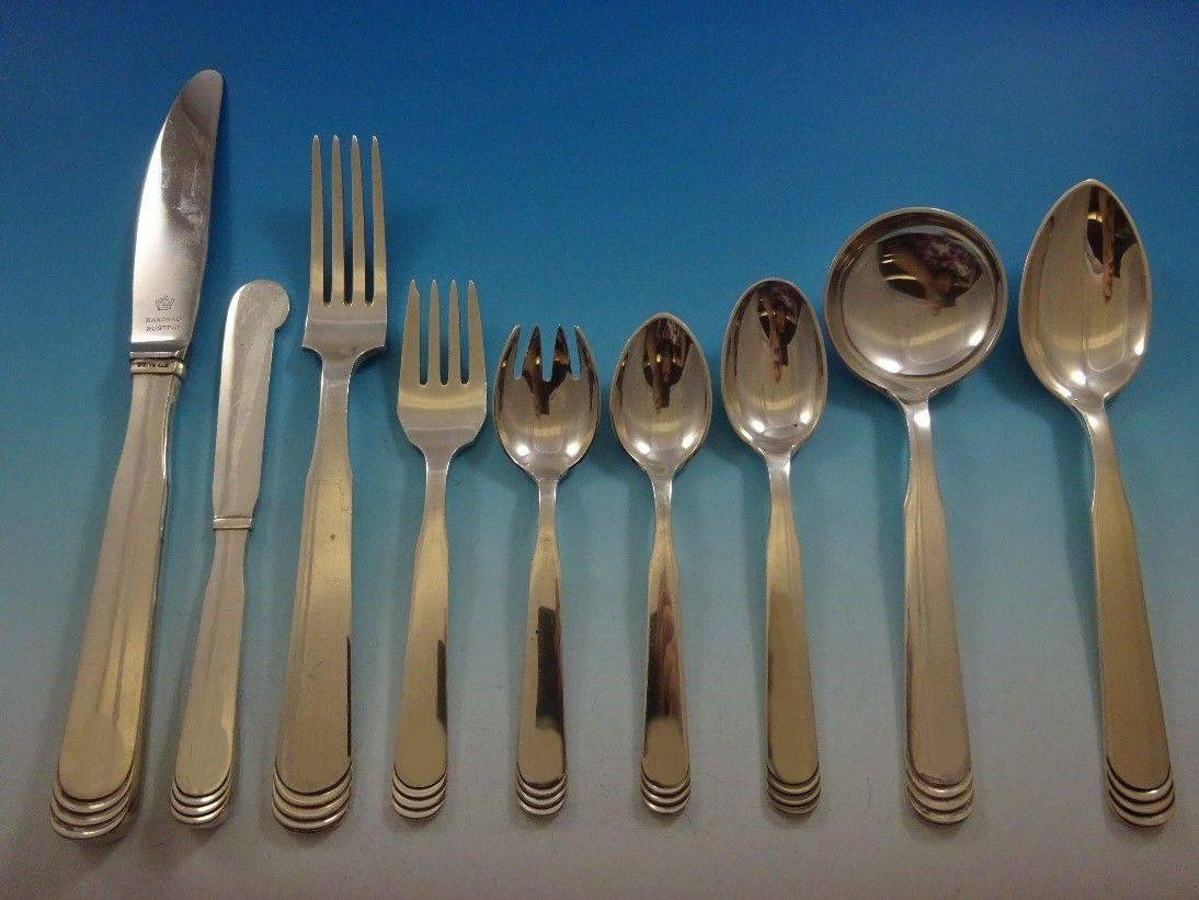 Ripple by Hans Hansen Danish sterling silver flatware set, 39 pieces. This set includes: 

four dinner knives, long handle, 9